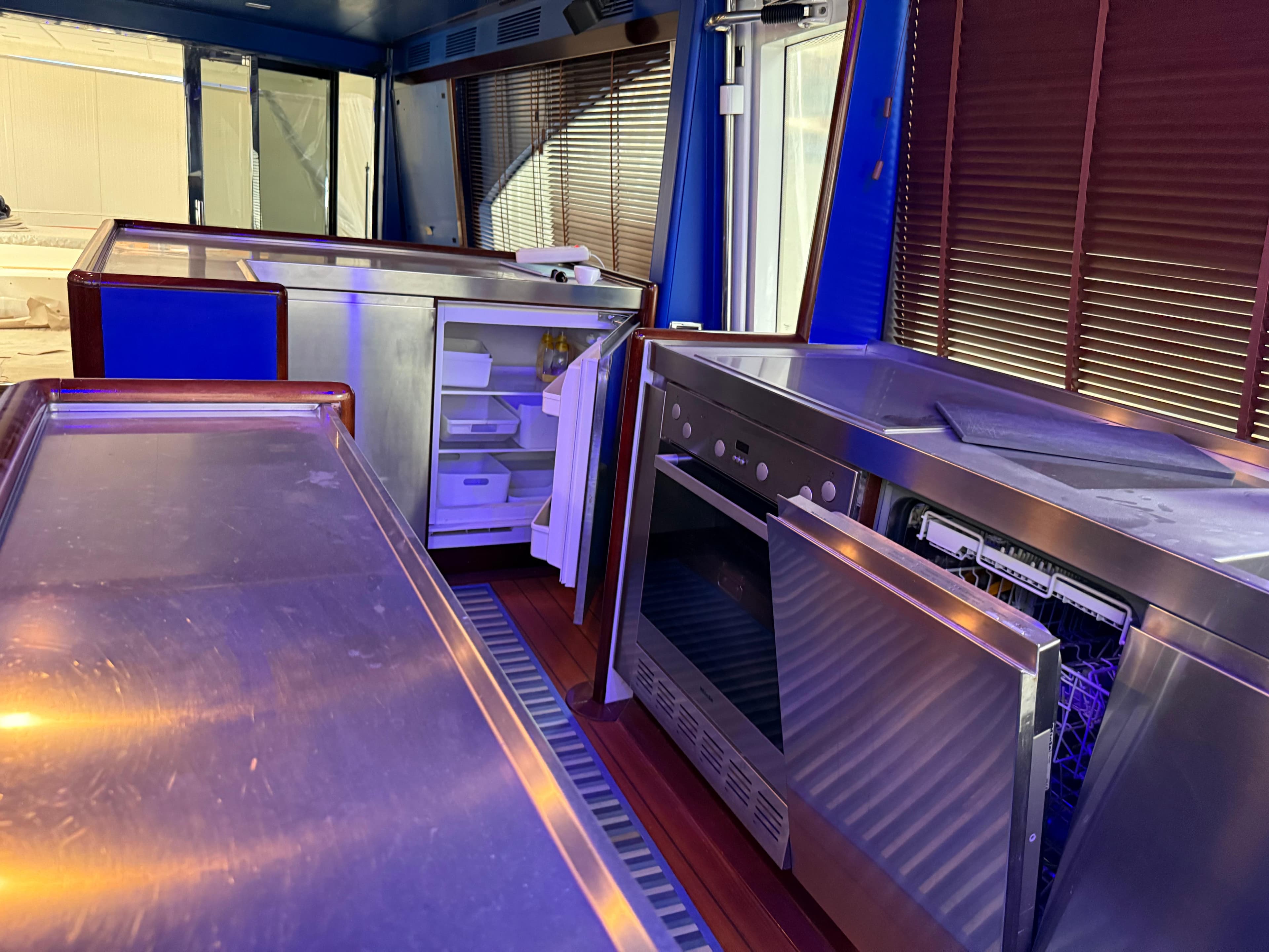 Interior kitchen of 2009 Franchini 74 Emozione yacht with modern appliances.
