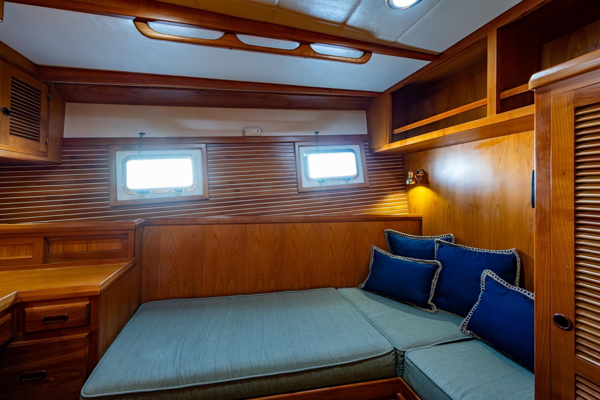Port office/guest cabin settee that converts to a berth