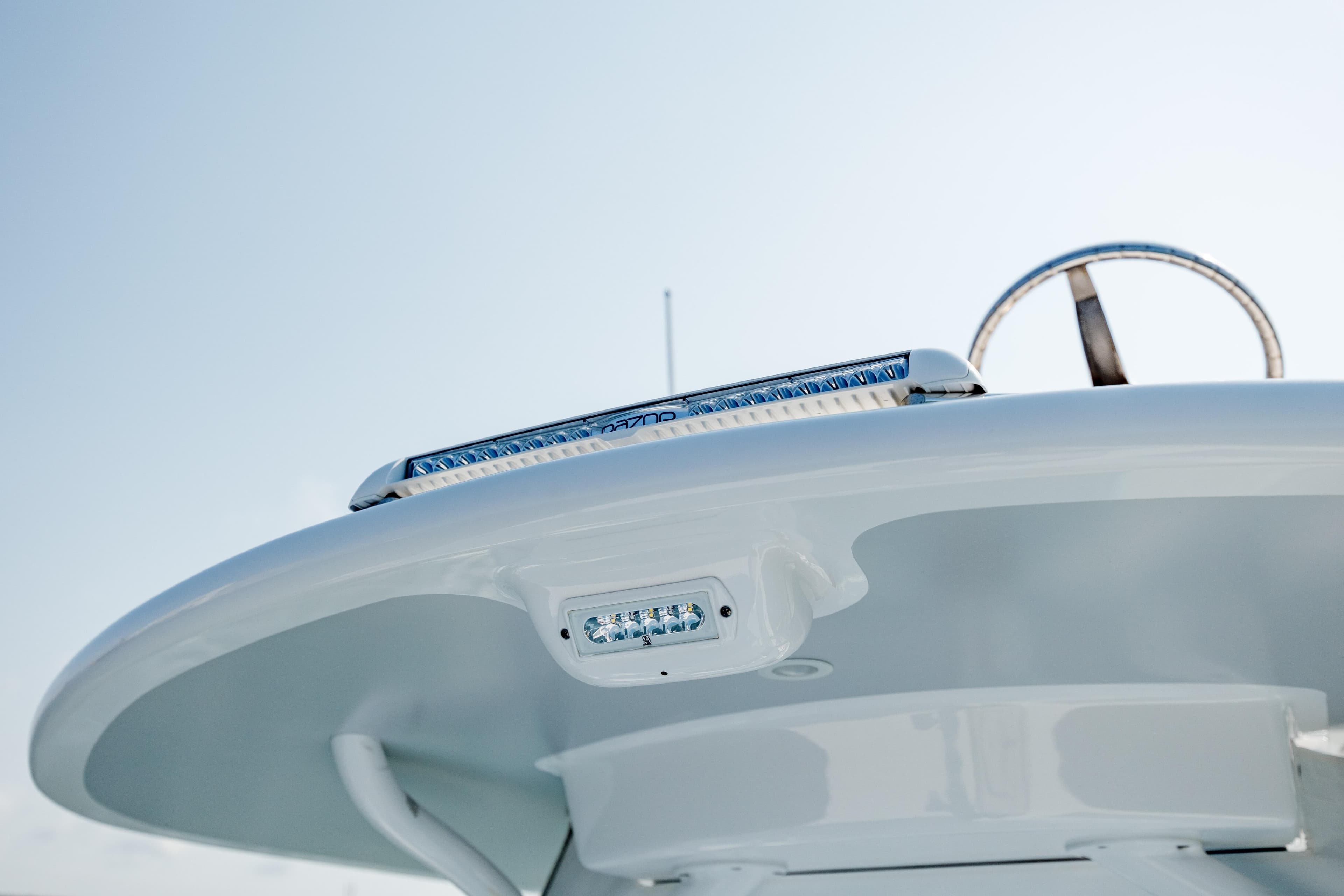 2019 Gamefisherman 26 Cuddy Cabin boat with modern LED lighting and sleek design.