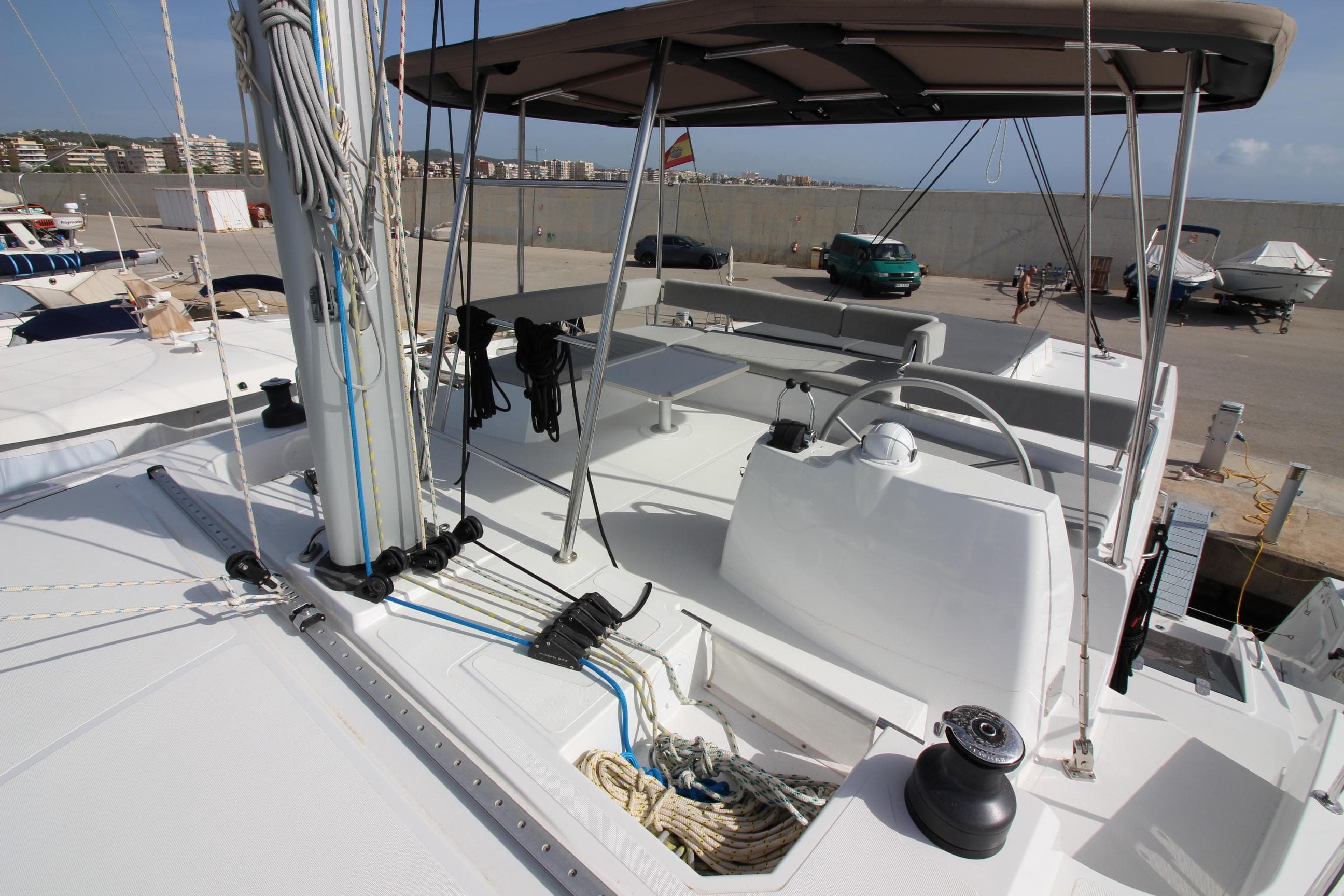 2022 Bali 4.6 yacht deck with rigging and shaded seating area.