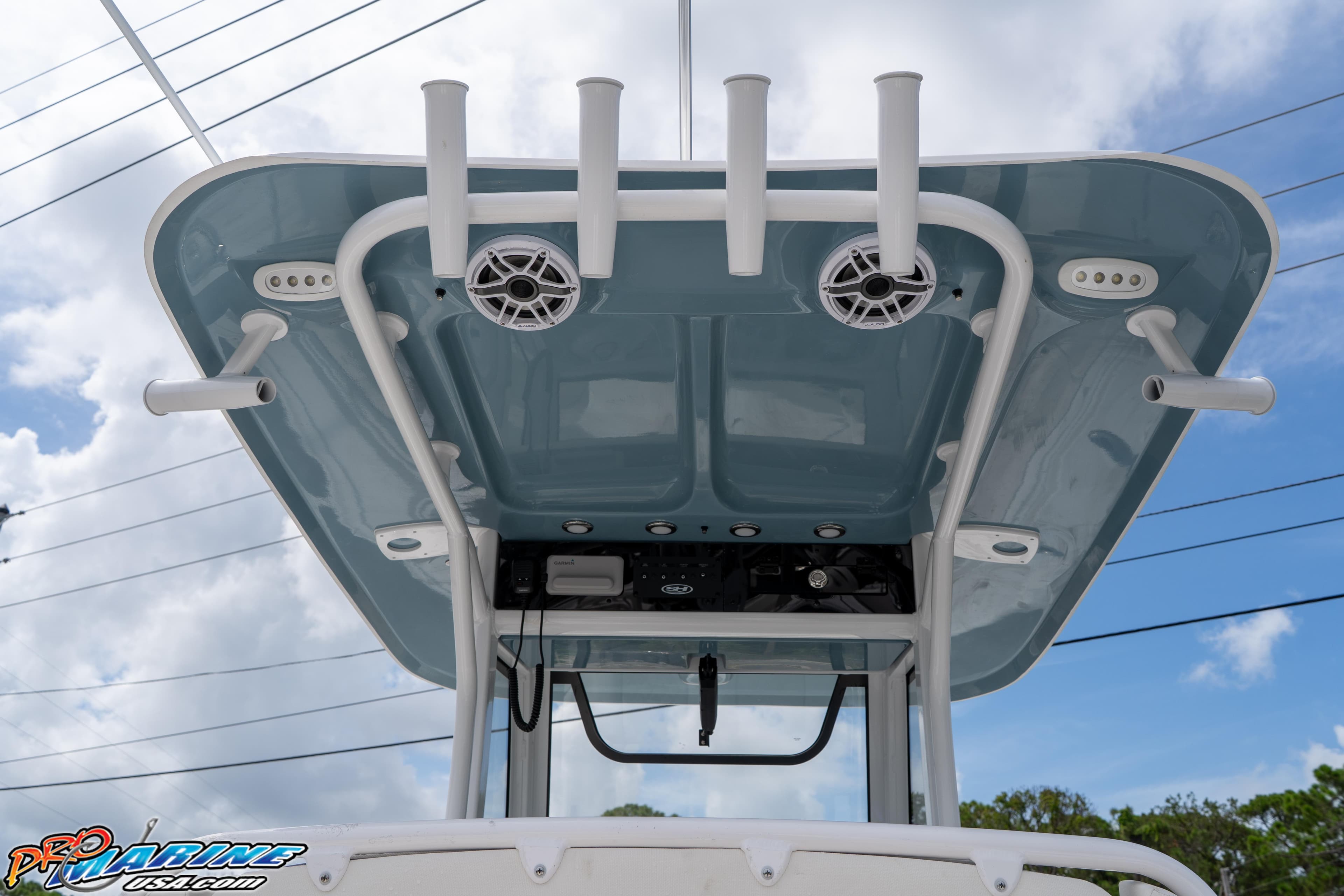 2026 Sea Hunt Ultra 265 SE boat top view with rod holders and speakers.