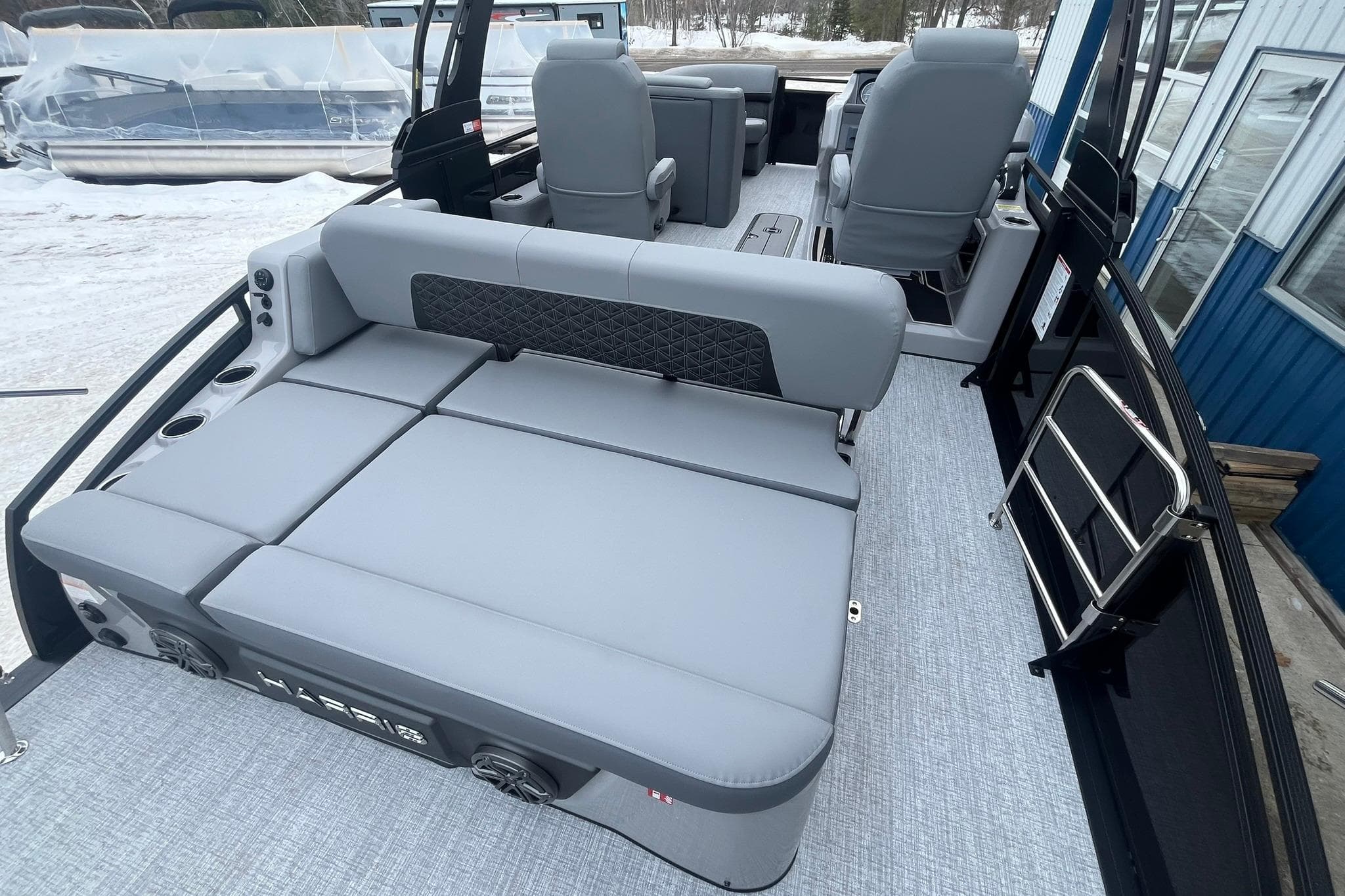 2025 Harris Solstice 230 pontoon boat interior with gray seating and modern design.