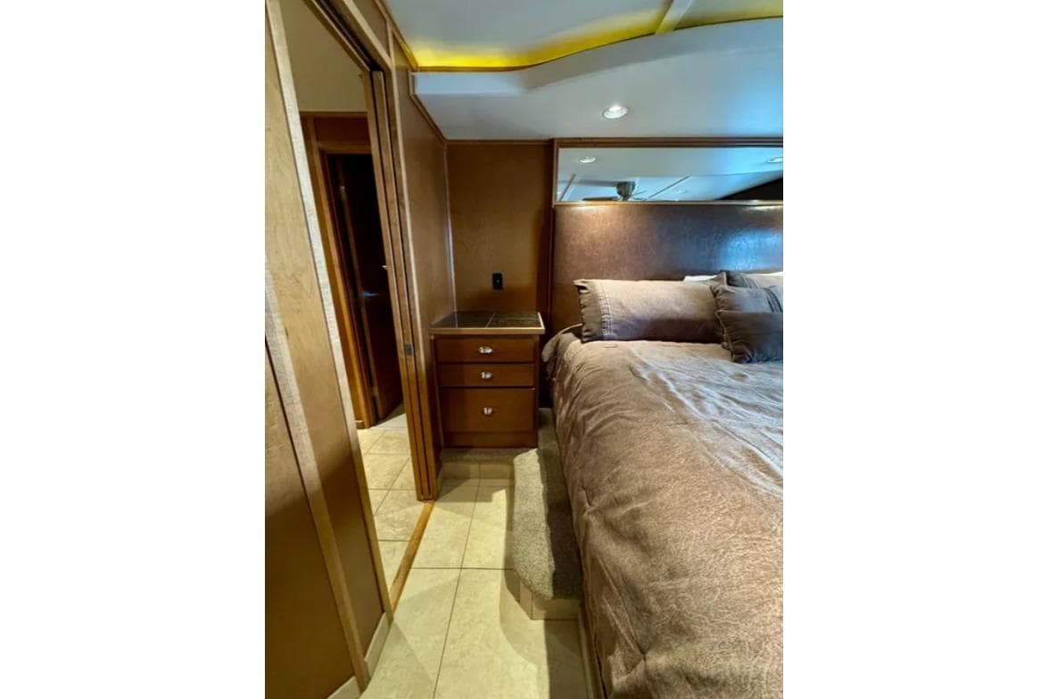 Luxurious bedroom interior in 2012 Bravada Helios Trip #7 houseboat.