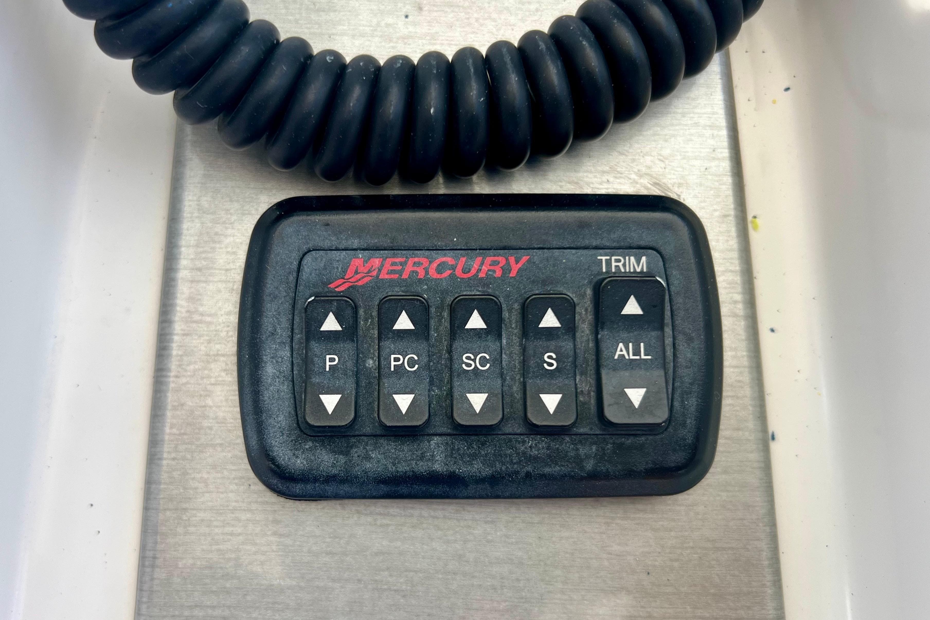 Mercury trim control panel on 2011 Deep Impact 36 Open boat.