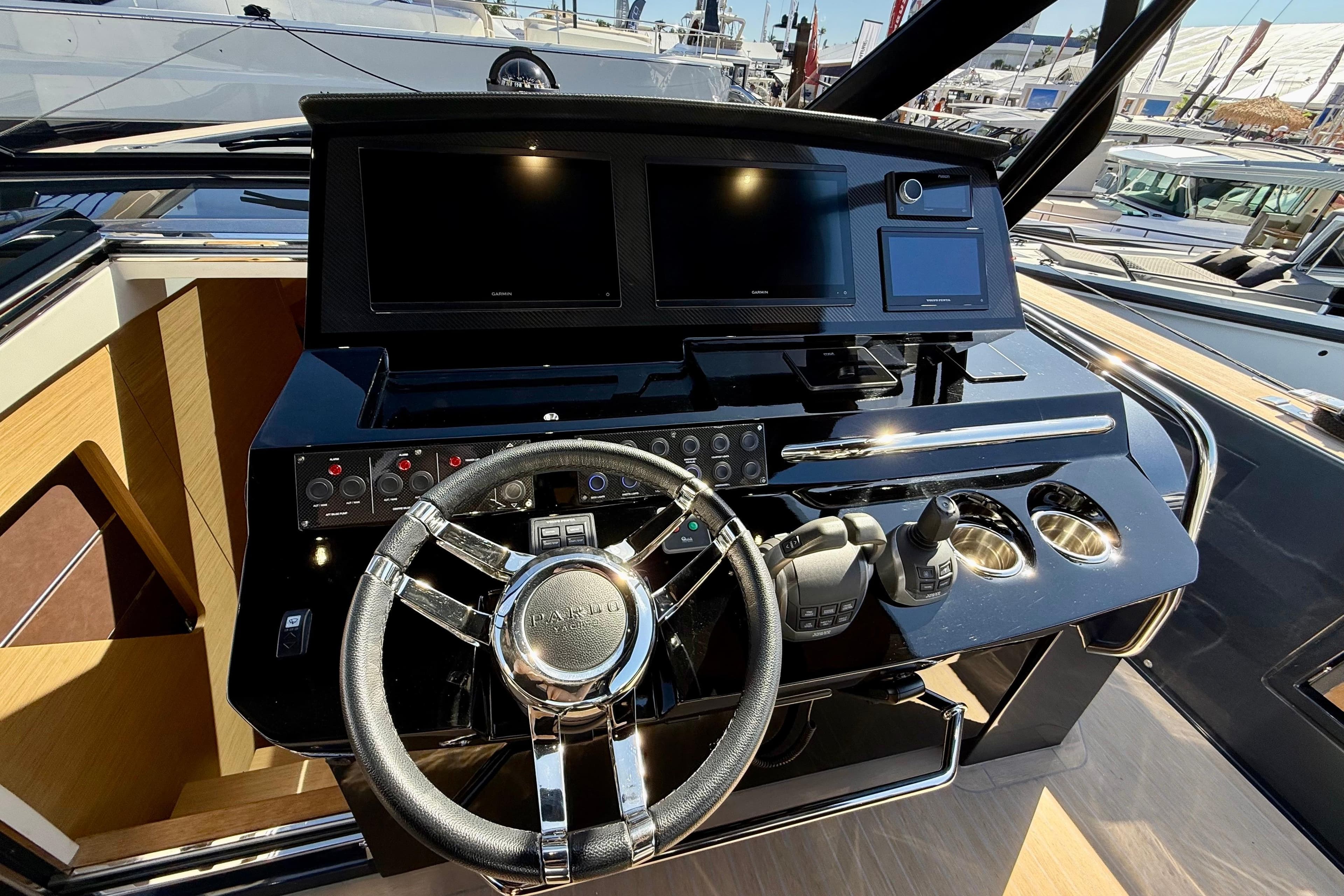 Helm of 2026 Pardo Yachts 50, featuring modern controls and dual screens.