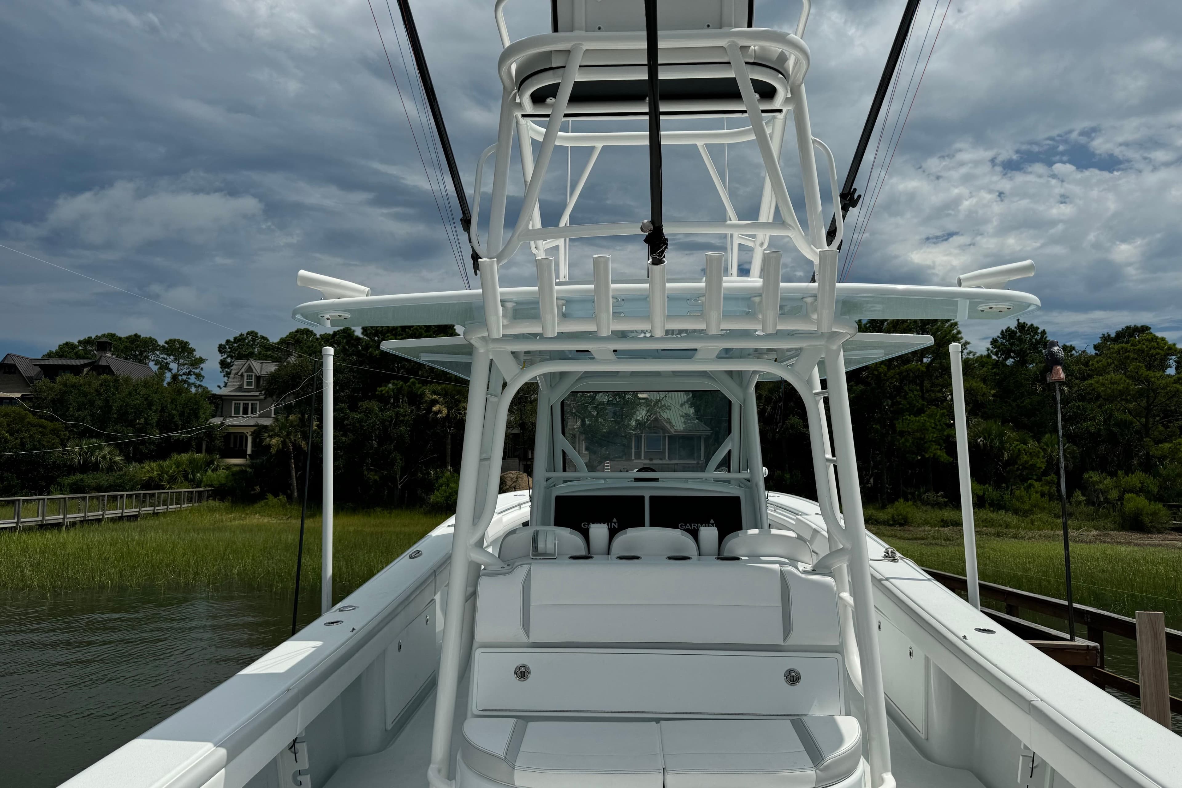 2024 Yellowfin 39 Offshore boat docked, showcasing sleek design and spacious deck.