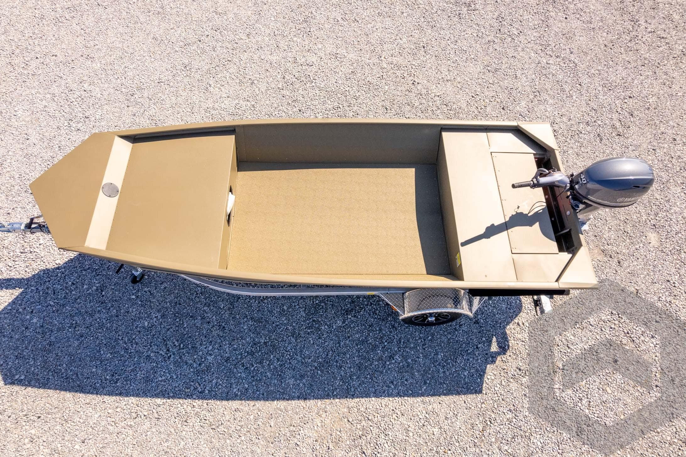 2026 G3 Gator Tough 1652 VBW boat on gravel, top view.