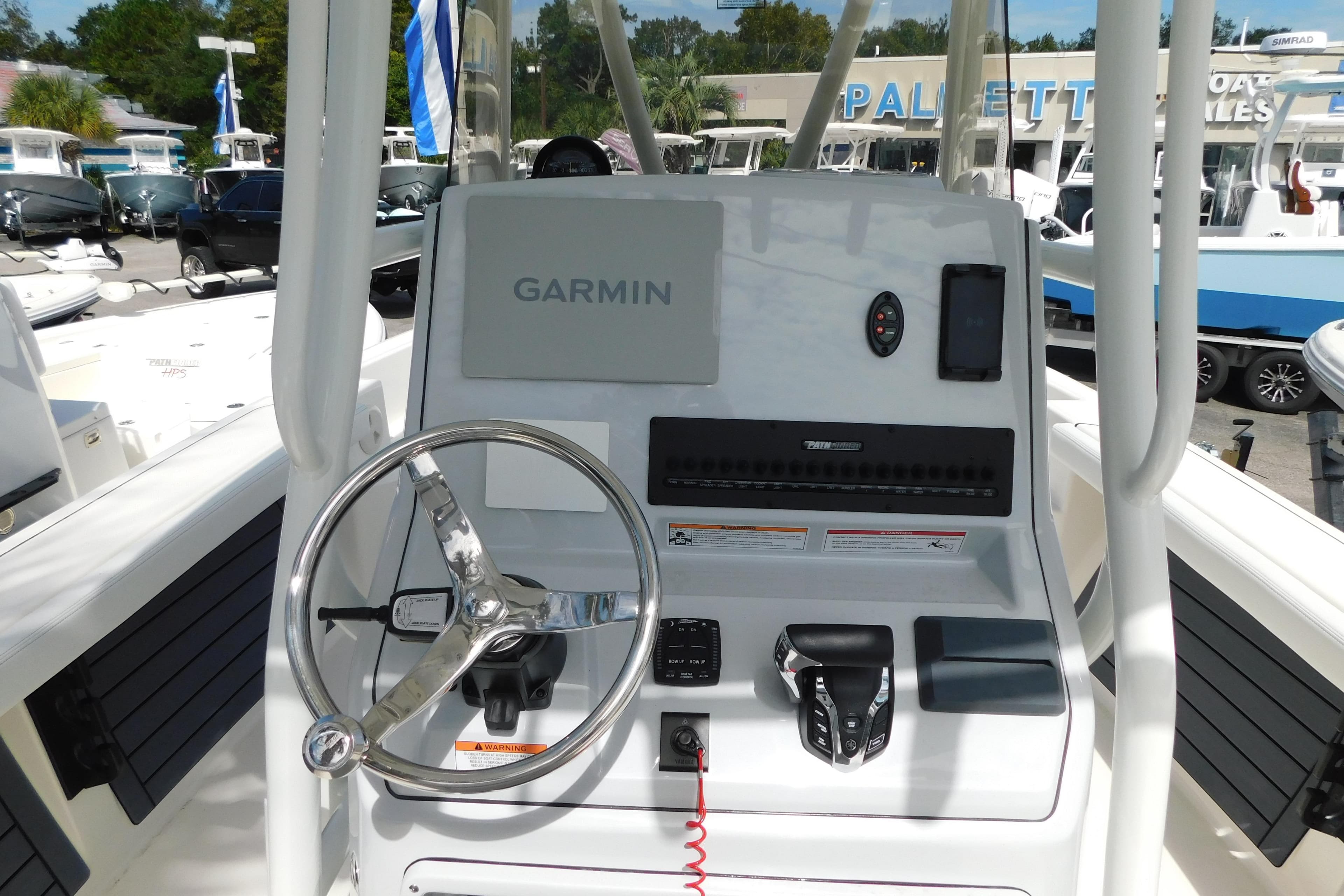 2026 Pathfinder 2400 TRS boat console with Garmin navigation system and steering wheel.