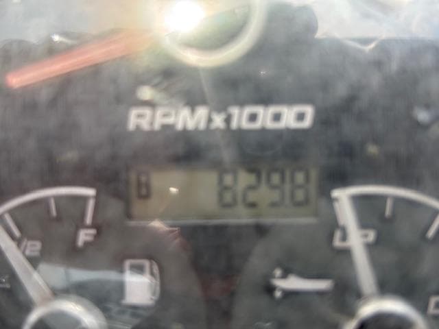 Close-up of a 2022 Hurricane SunDeck Sport 185 OB boat dashboard showing RPM and fuel gauges.