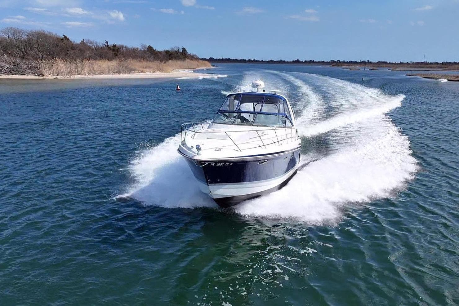 2006 Formula 34 Performance Cruiser speeding on the water.