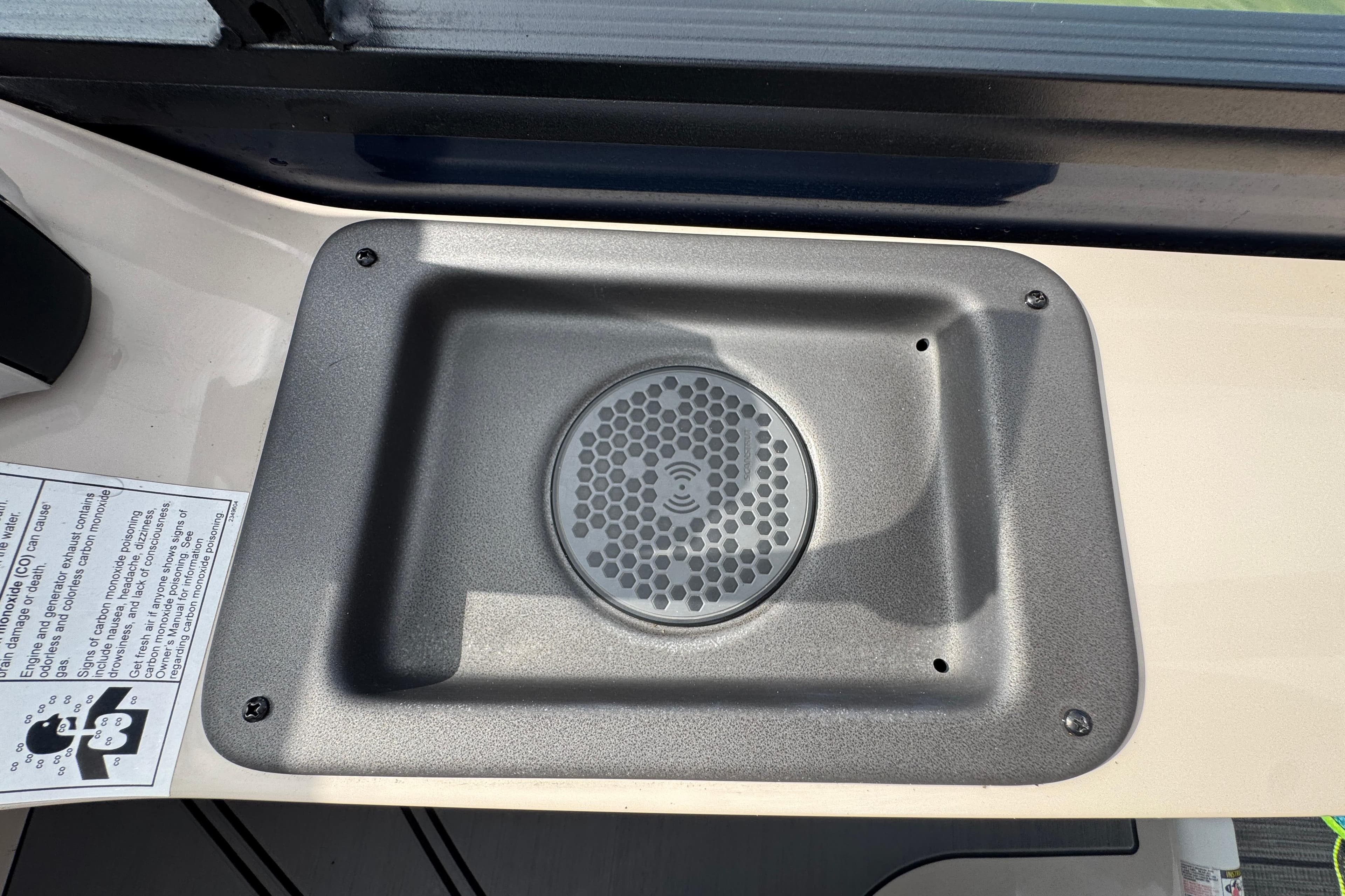 Speaker panel on 2021 Harris Solstice 230 boat dashboard.