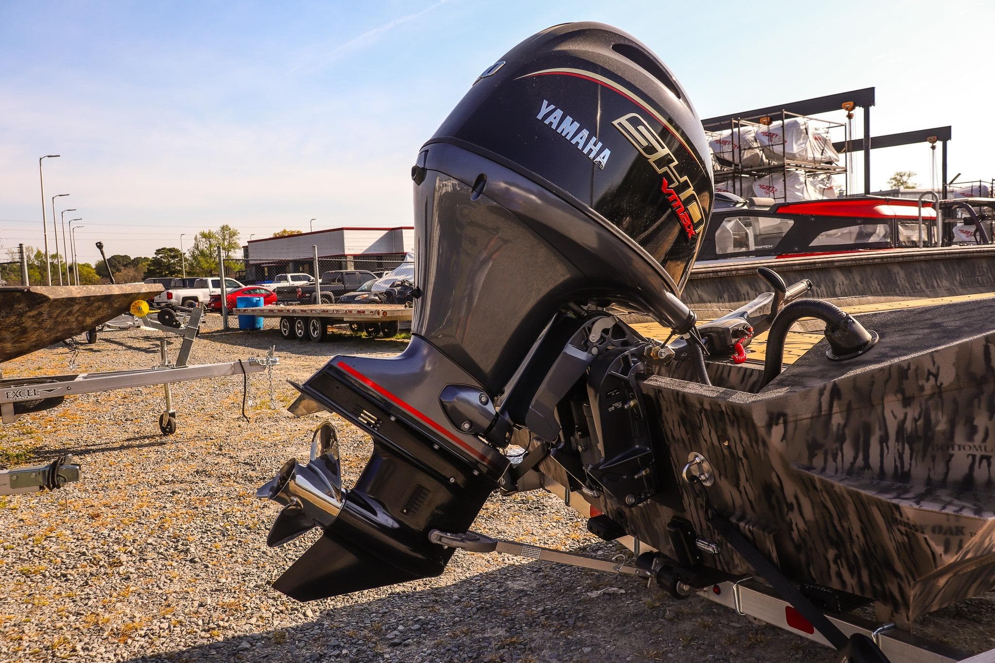 2026 Excel 183 Tomahawk boat with Yamaha outboard motor in a dealership lot.