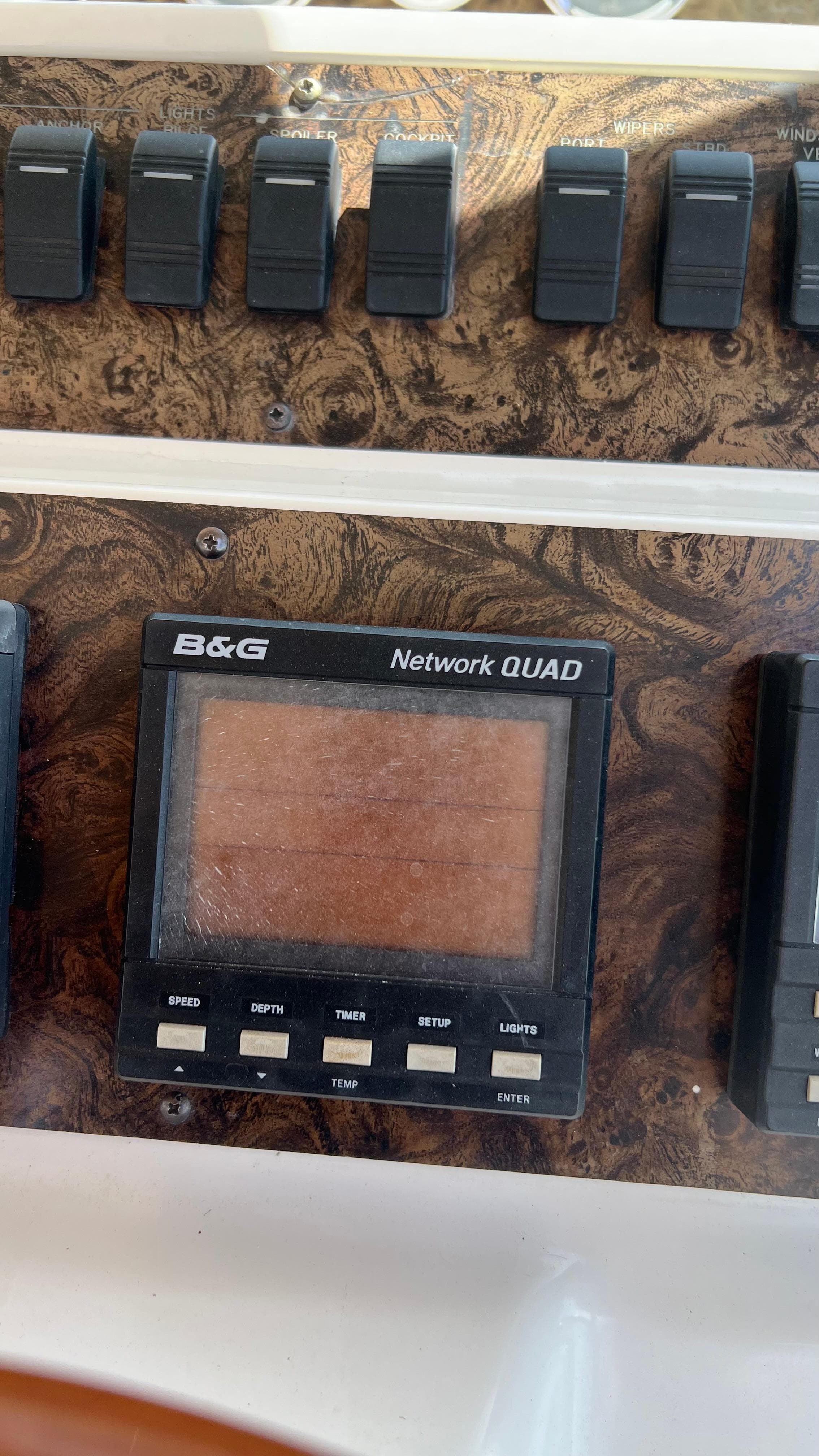 Control panel of a 1997 Sea Ray 400 boat with B&G Network QUAD display.