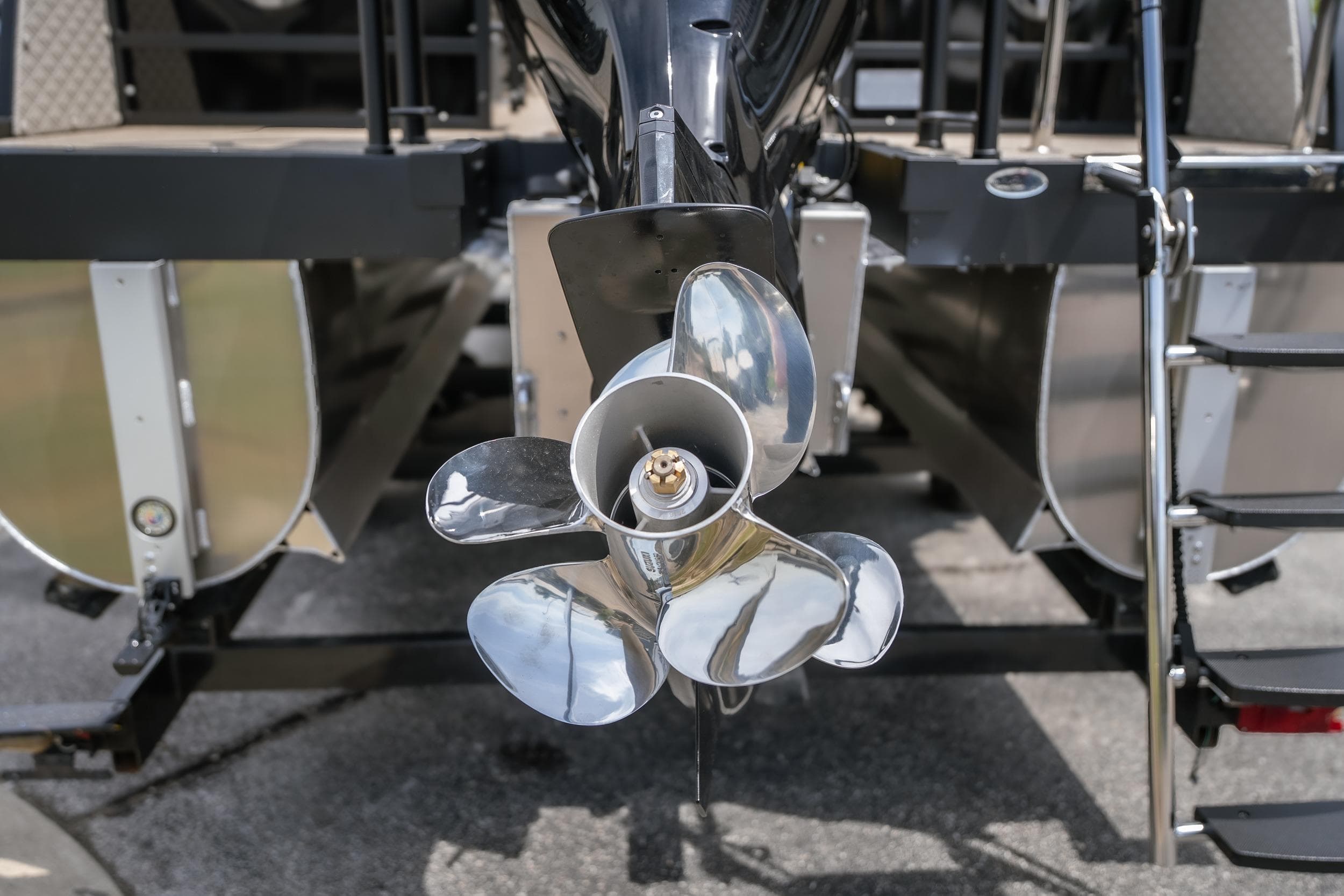 Propeller of 2026 JC Sporttoon 26TT boat, showcasing sleek design and metallic finish.