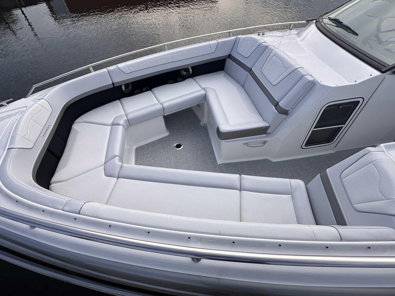 2025 Formula 350 Crossover Bowrider I/O with spacious white seating area.