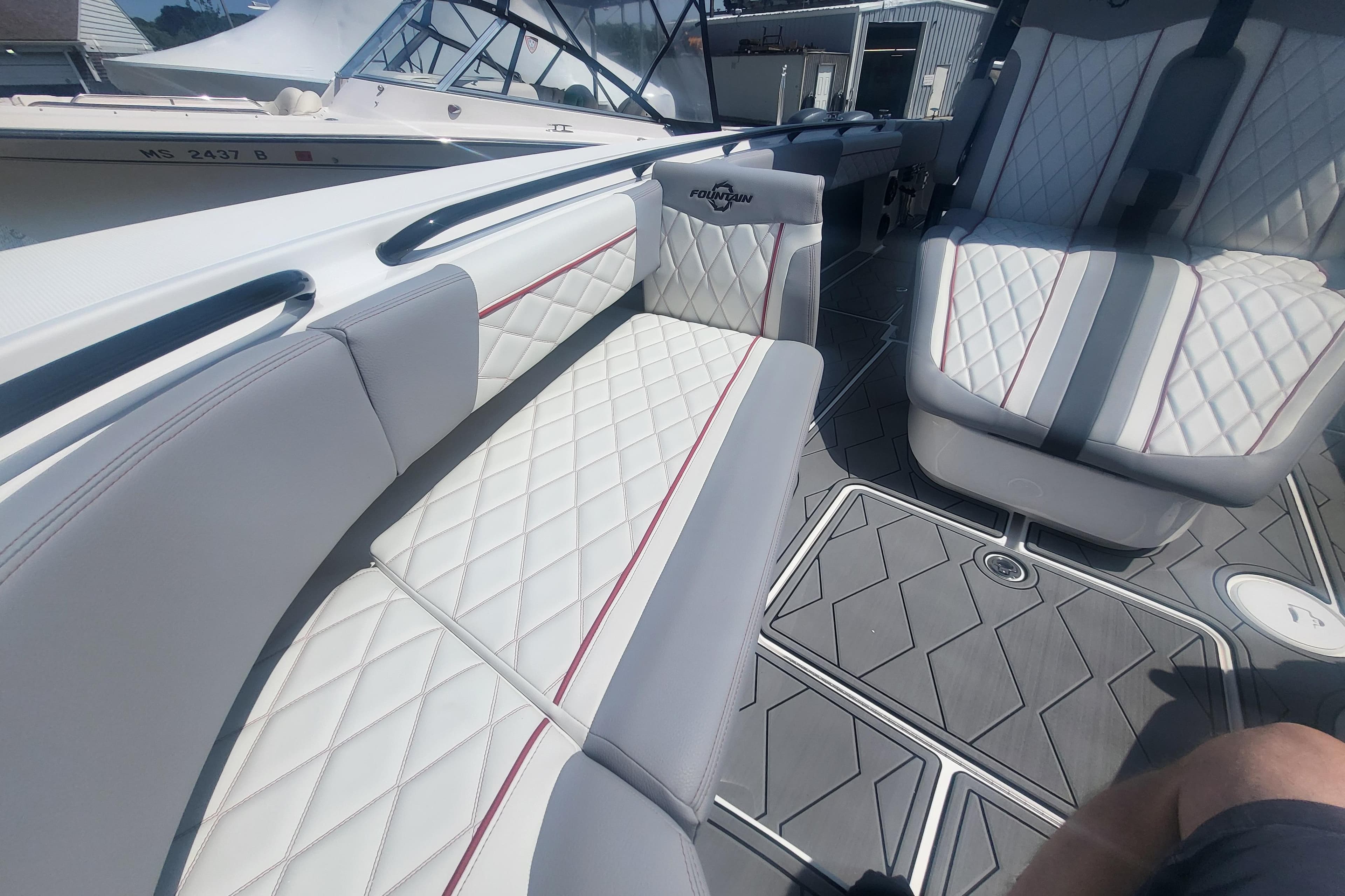 2025 Fountain 34 SC boat interior with quilted seating and modern design.