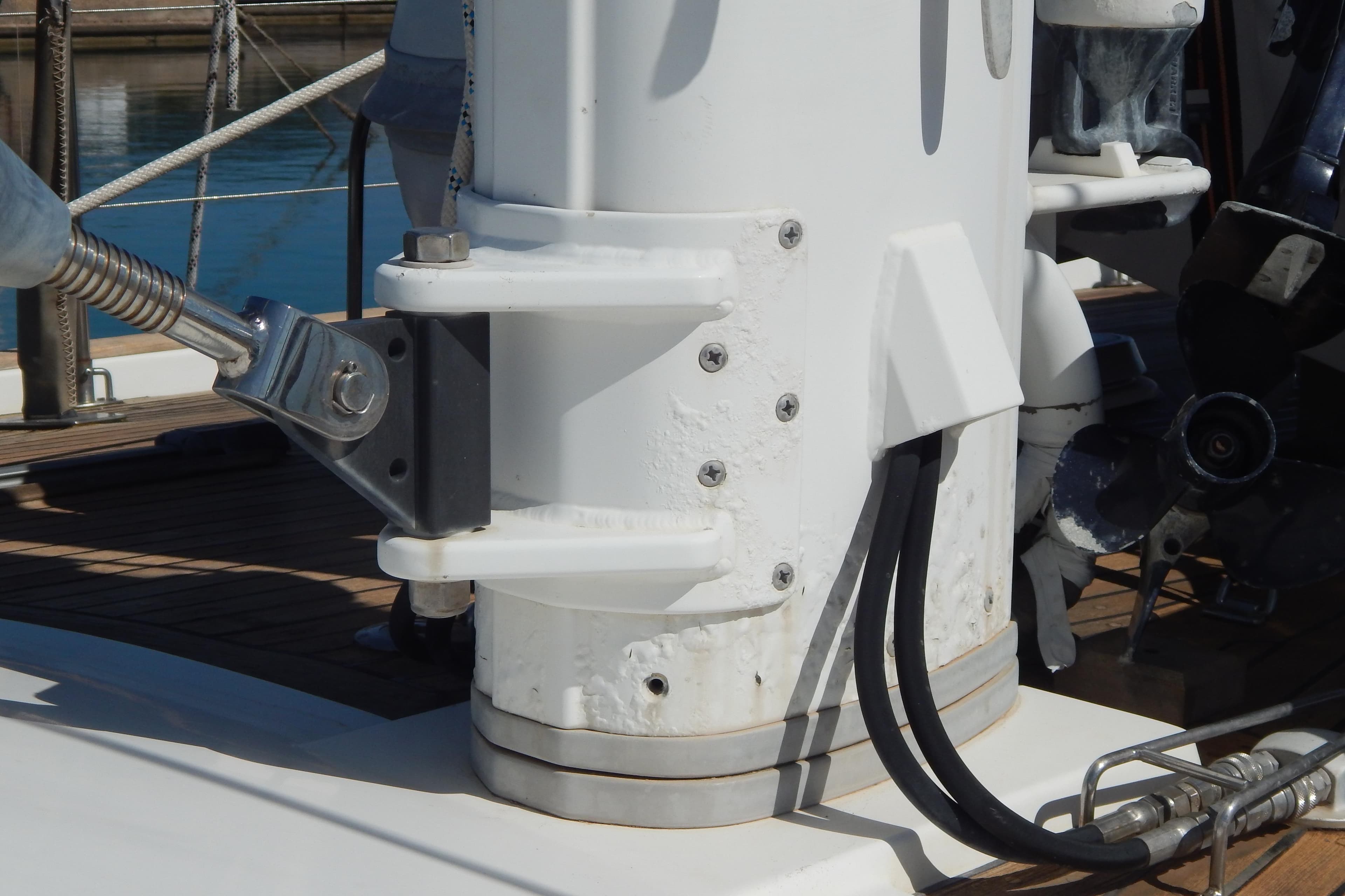 Close-up of a 2003 Contest 60 C yacht mast base with rigging and cables.