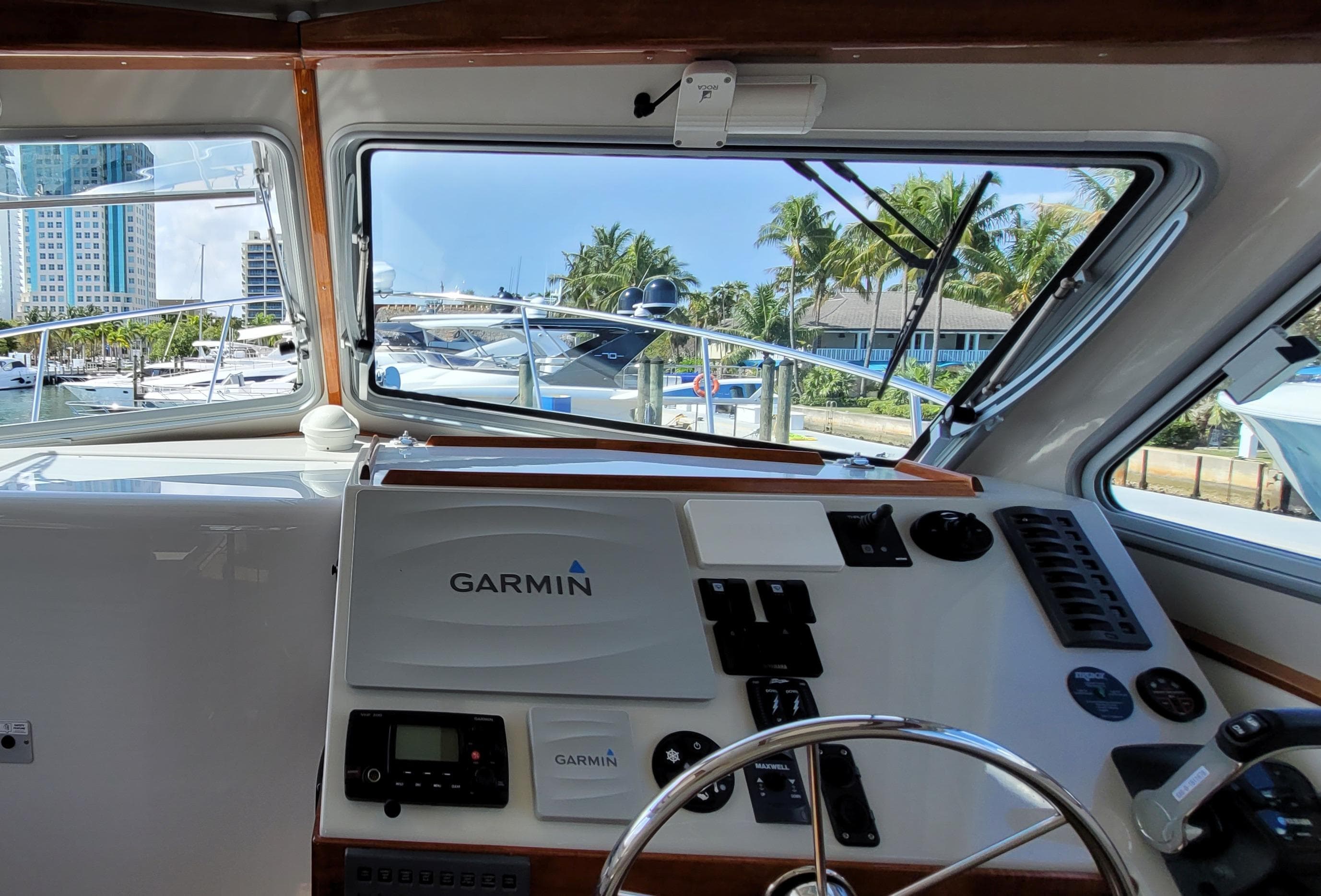 Interior view of 2015 Eastport 32 OBX with Garmin controls.