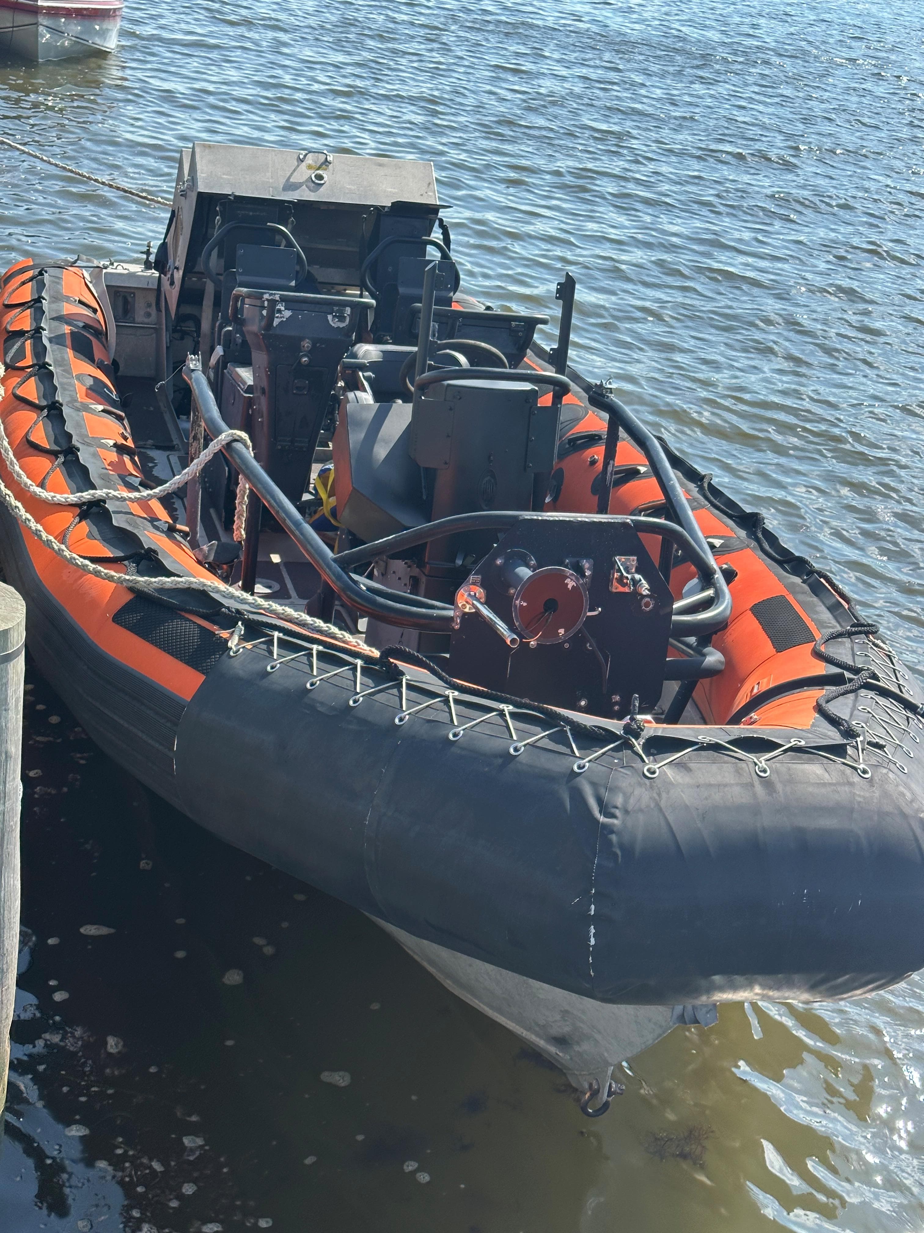 2008 Zodiac 24 inflatable boat docked on water.