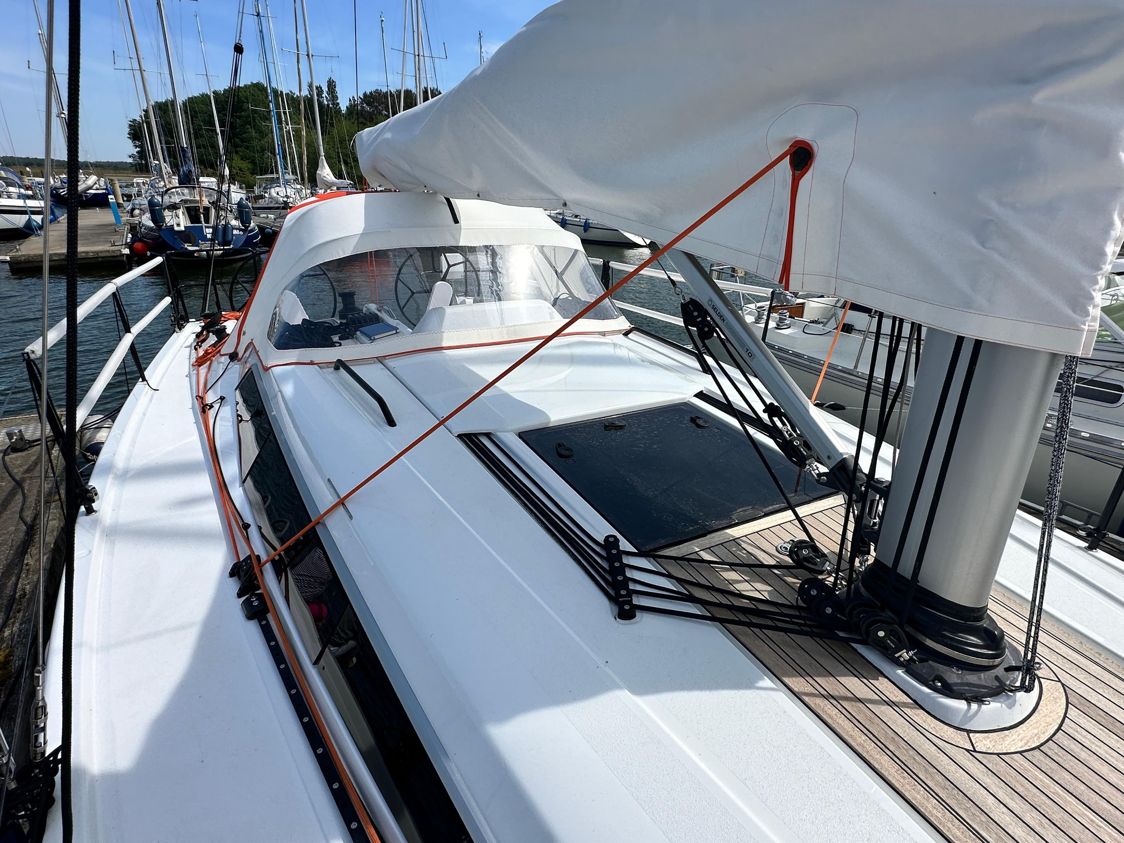 2023 Dehler 34 sailboat docked, showcasing modern design.