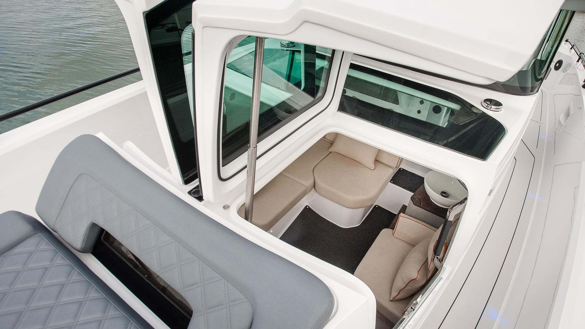 2024 Axopar 37 XC Cross Cabin interior with seating and modern design.