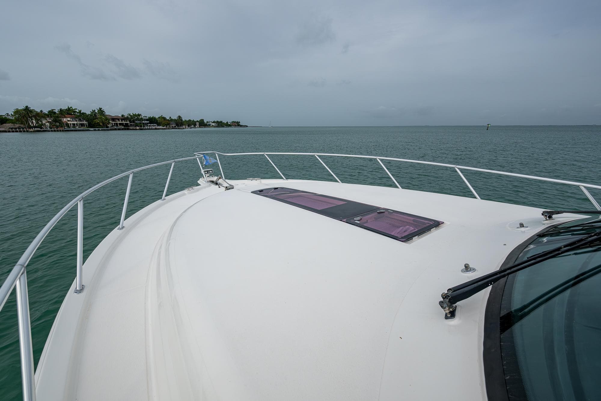 2009 Tiara Yachts 39 Open bow view on calm waters.