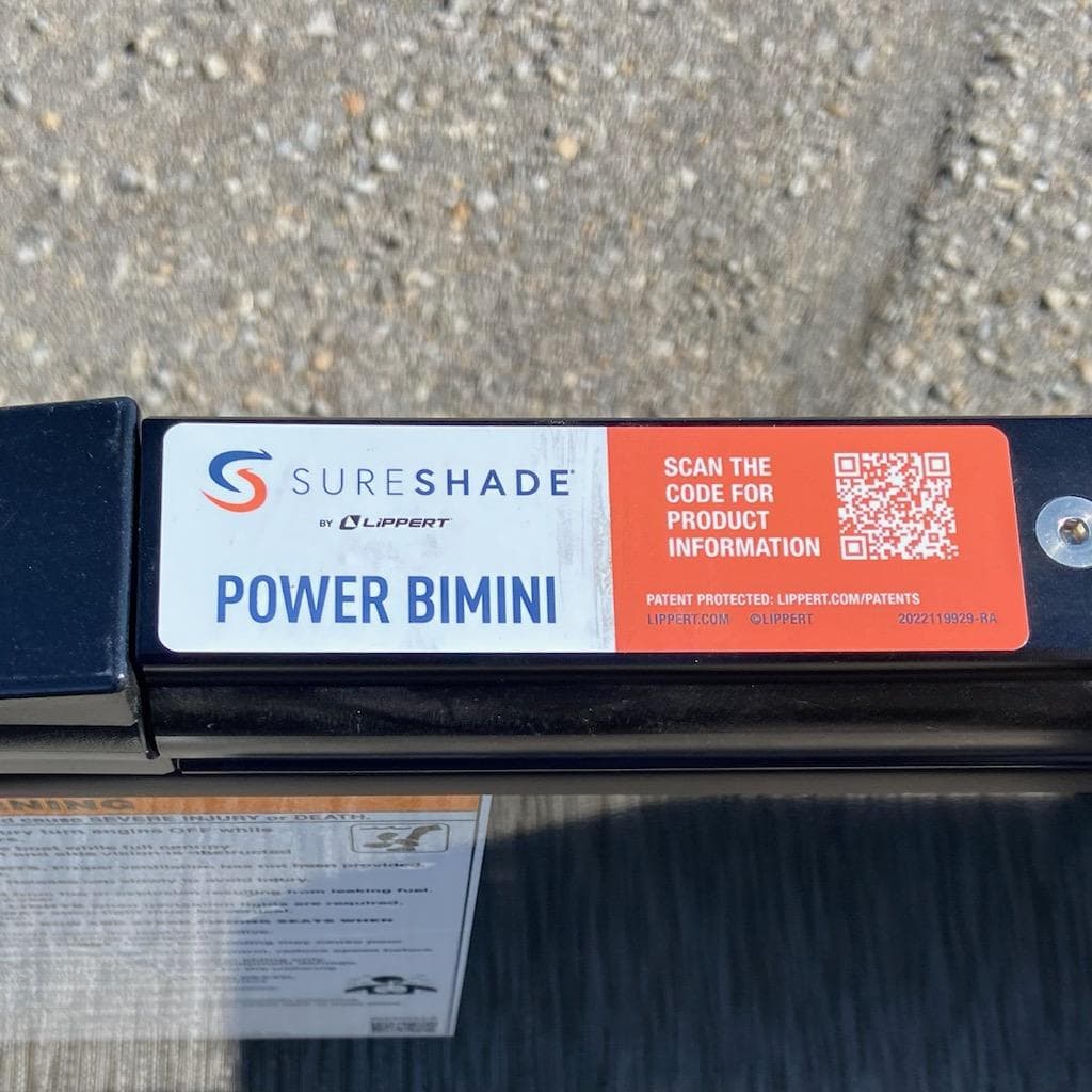 SureShade Power Bimini label with QR code on 2024 Godfrey Sweetwater SW2286SFL.
