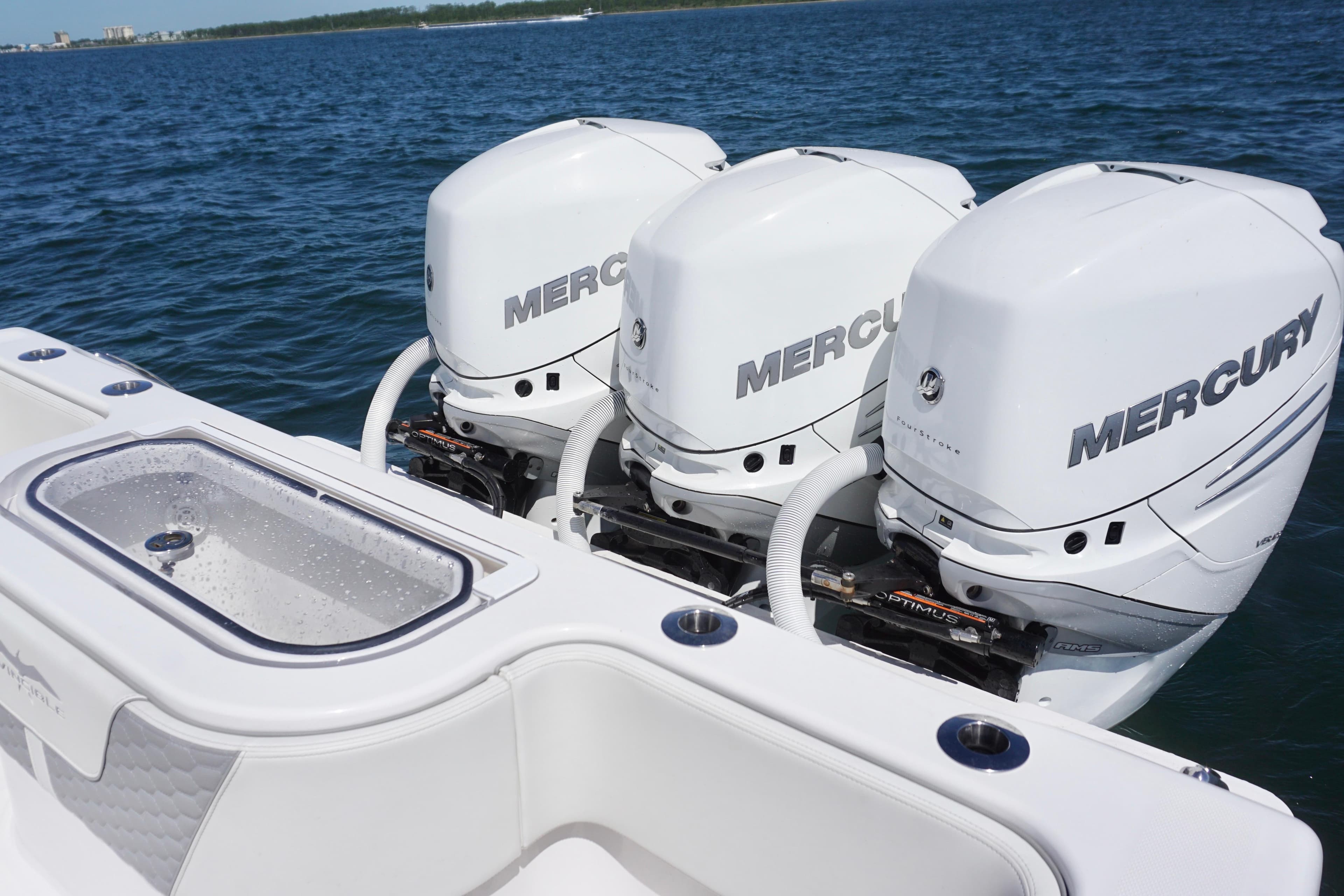 Triple Mercury outboard engines on a 2023 Invincible 36 Open Fisherman boat.