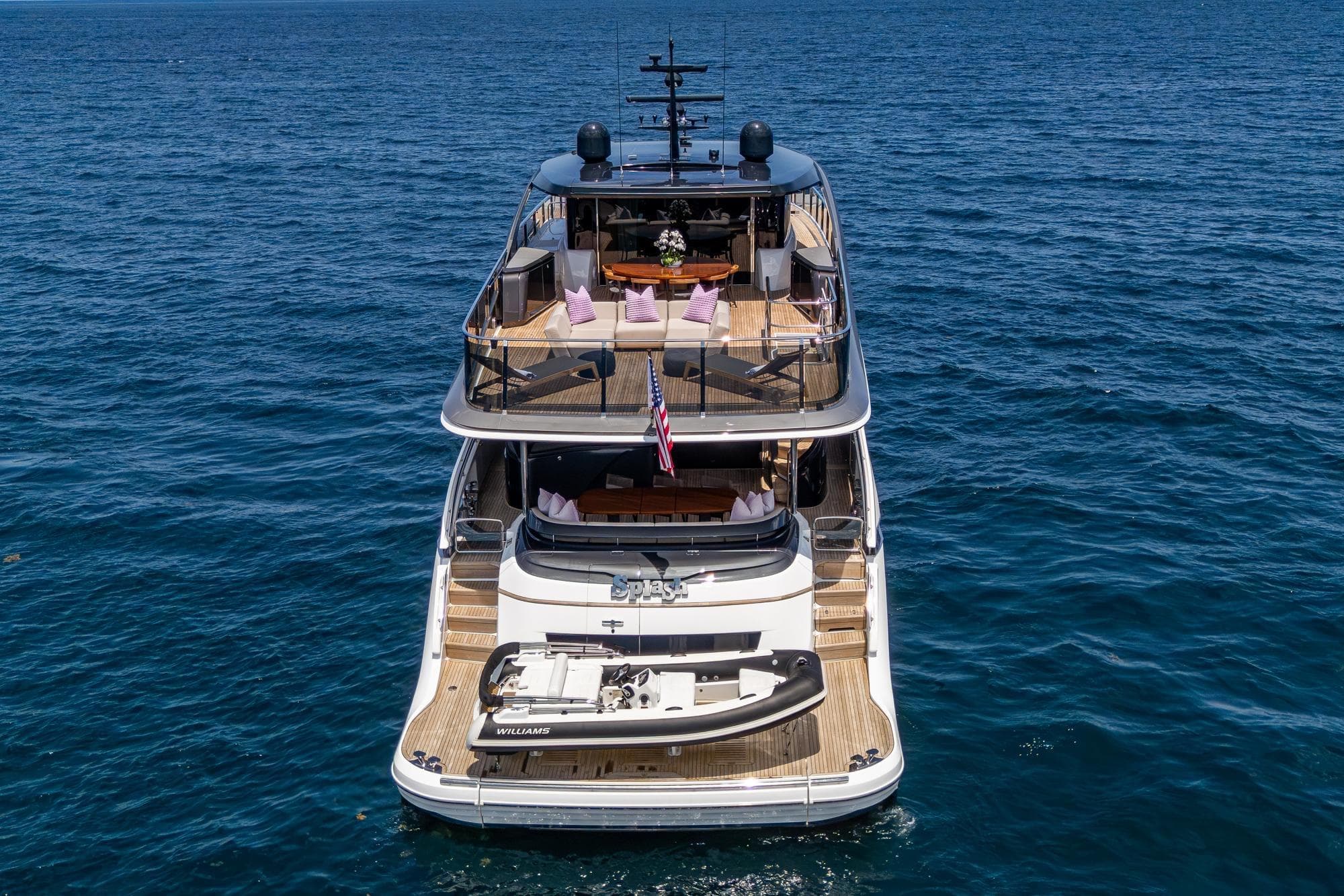 Luxurious 2022 Princess X95 yacht on open sea, showcasing elegant design and spacious decks.