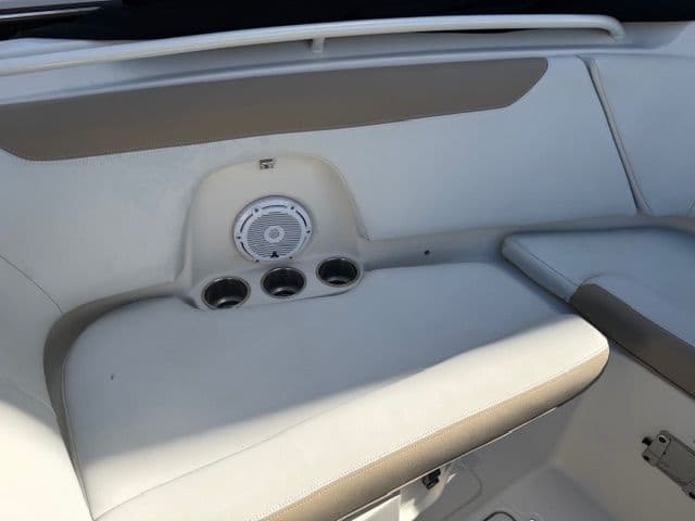 Interior of 2016 Sailfish 275 DC with speaker and cup holders.