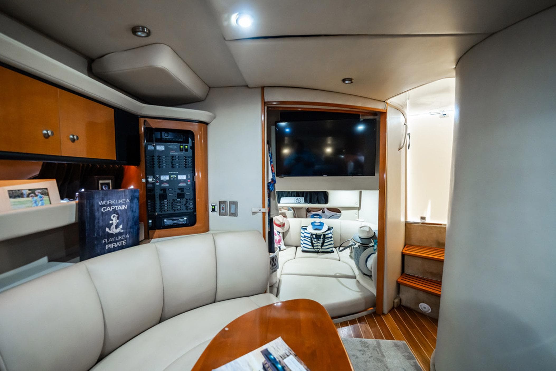 Luxurious interior of 2008 Chaparral Signature 350 yacht with cozy seating and modern amenities.