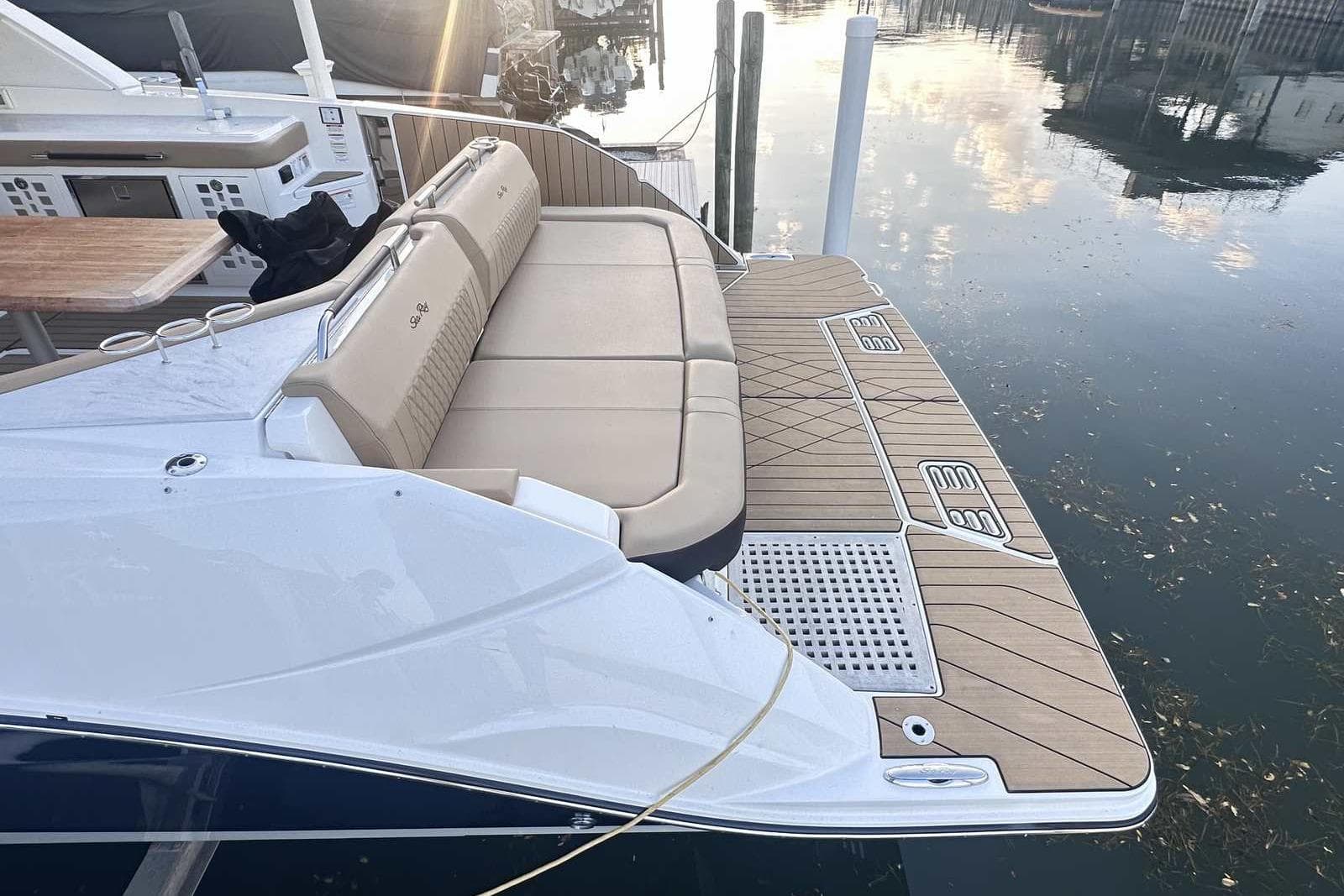 2024 Sea Ray SLX 400 boat with spacious deck and luxurious seating.