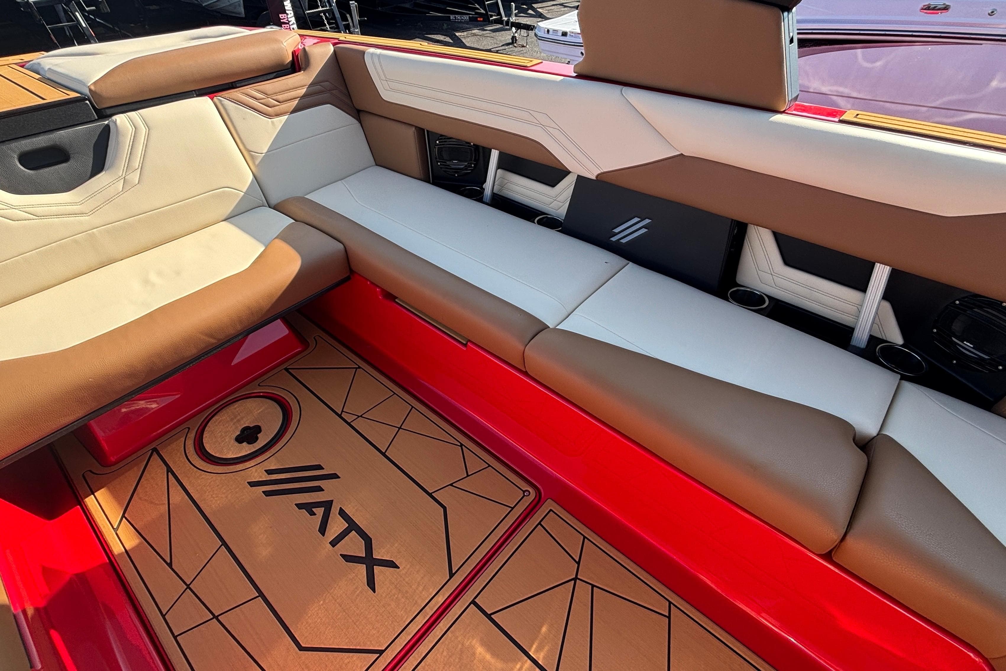 Luxurious interior of 2026 ATX Surf Boats 24 Type-S with stylish seating and flooring.