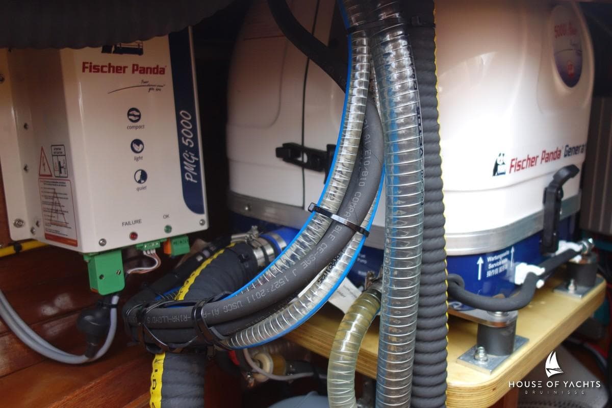Engine room of 1988 Pieter Beeldsnijder 42 yacht with Fischer Panda generator.