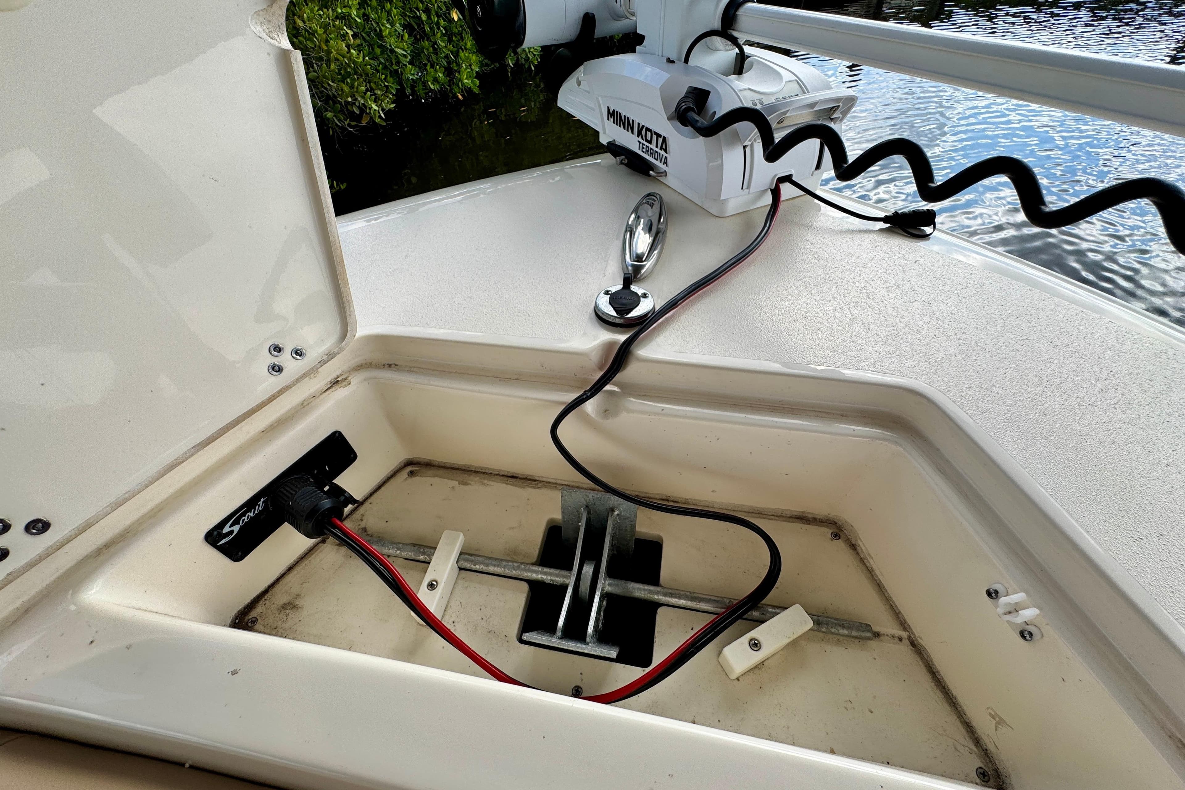 2024 Scout 195 Sportfish boat anchor compartment with Minn Kota Terrova trolling motor.