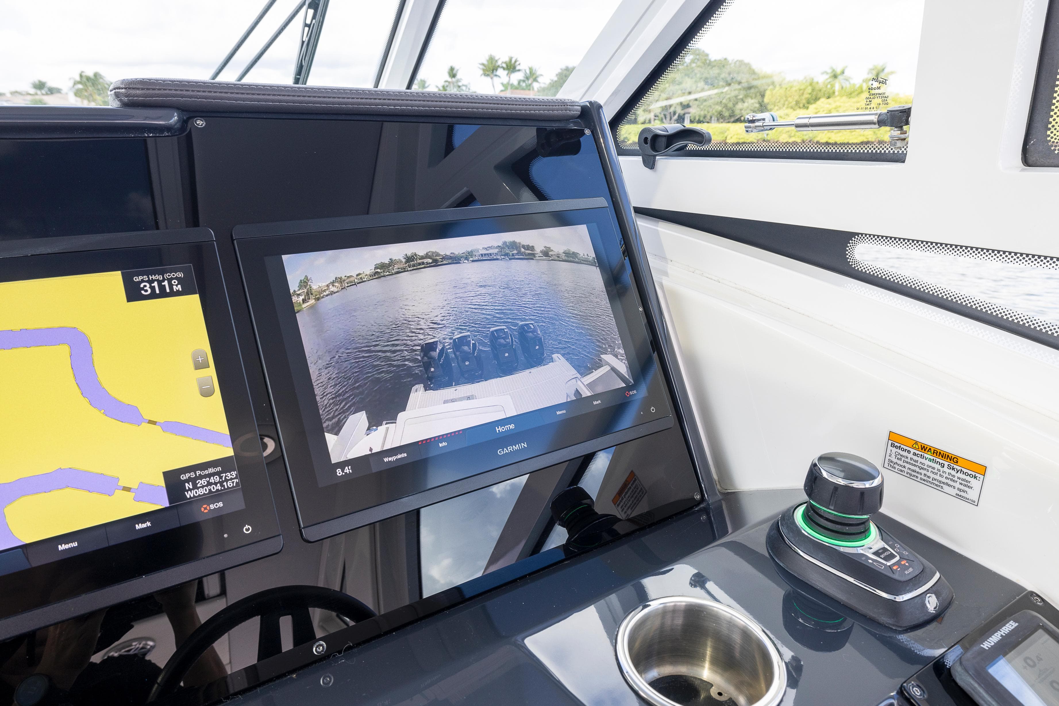 Dashboard of 2019 Formula 430 Super Sport Crossover with navigation screens and controls.