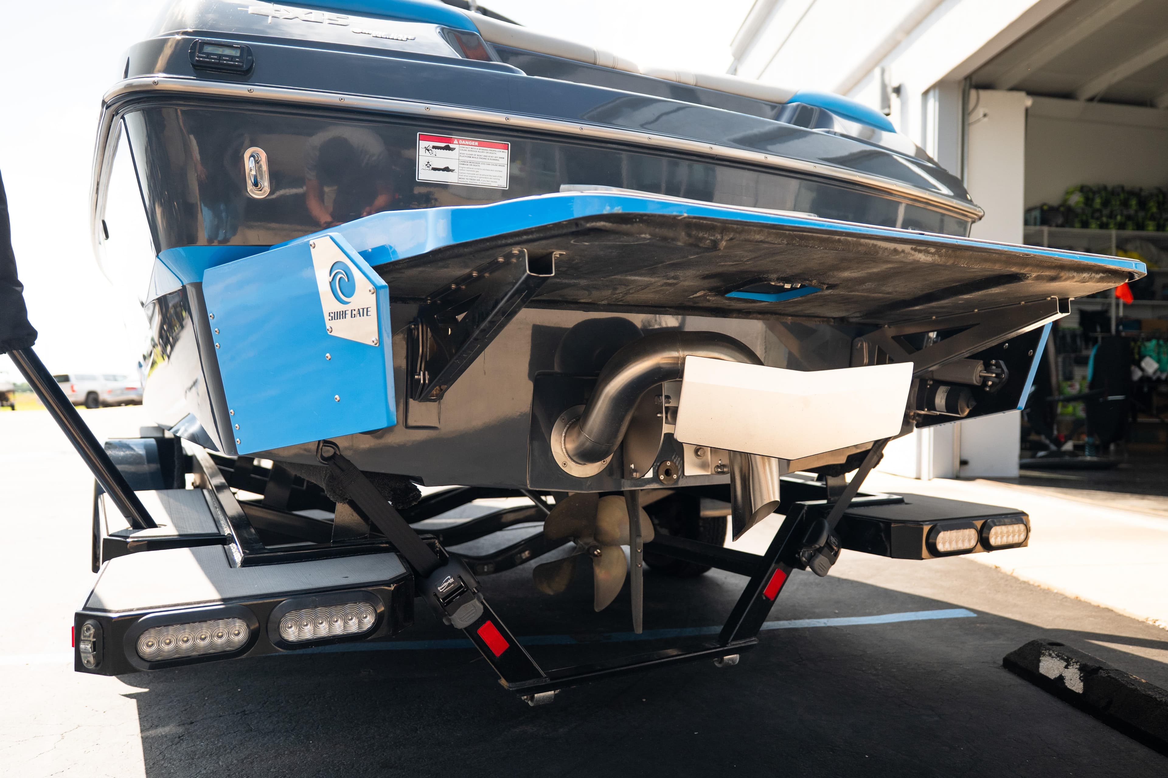 Rear view of a 2018 Axis T23 boat with Surf Gate technology.
