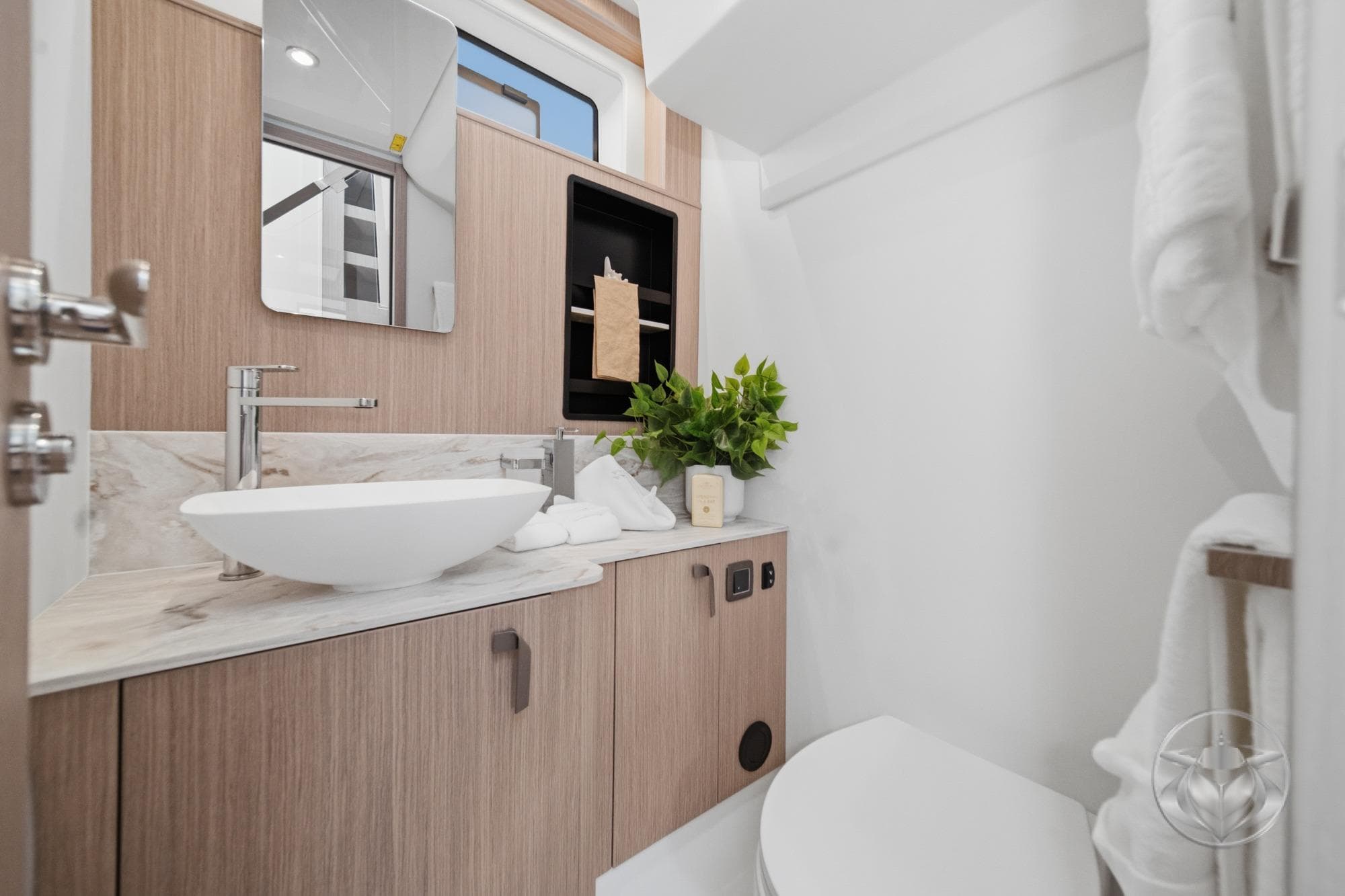 Modern bathroom in 2026 Prestige F5.7 yacht with sleek fixtures and elegant design.