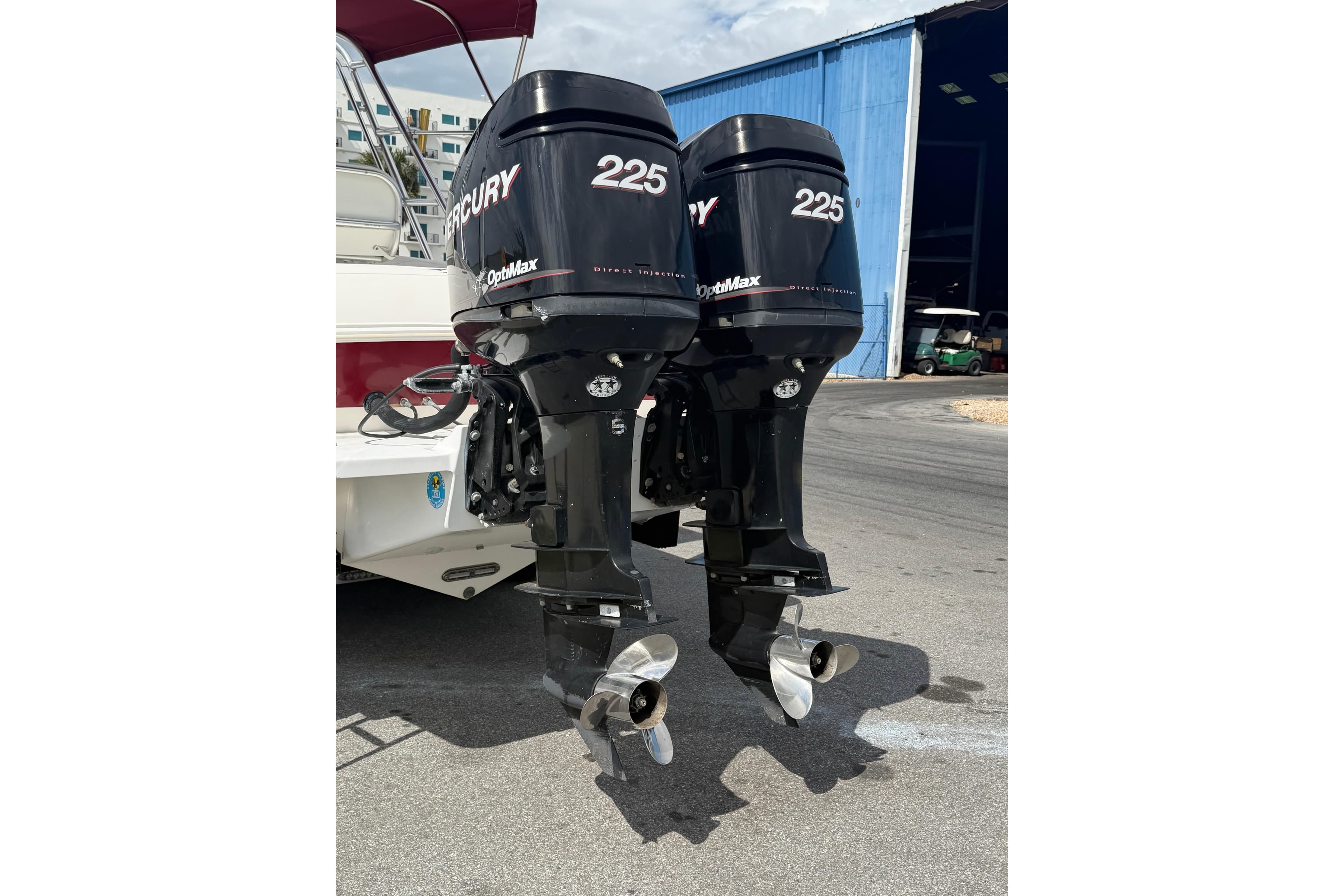 Twin Mercury 225 OptiMax engines on a 1997 Wellcraft 302 Scarab Sport boat.
