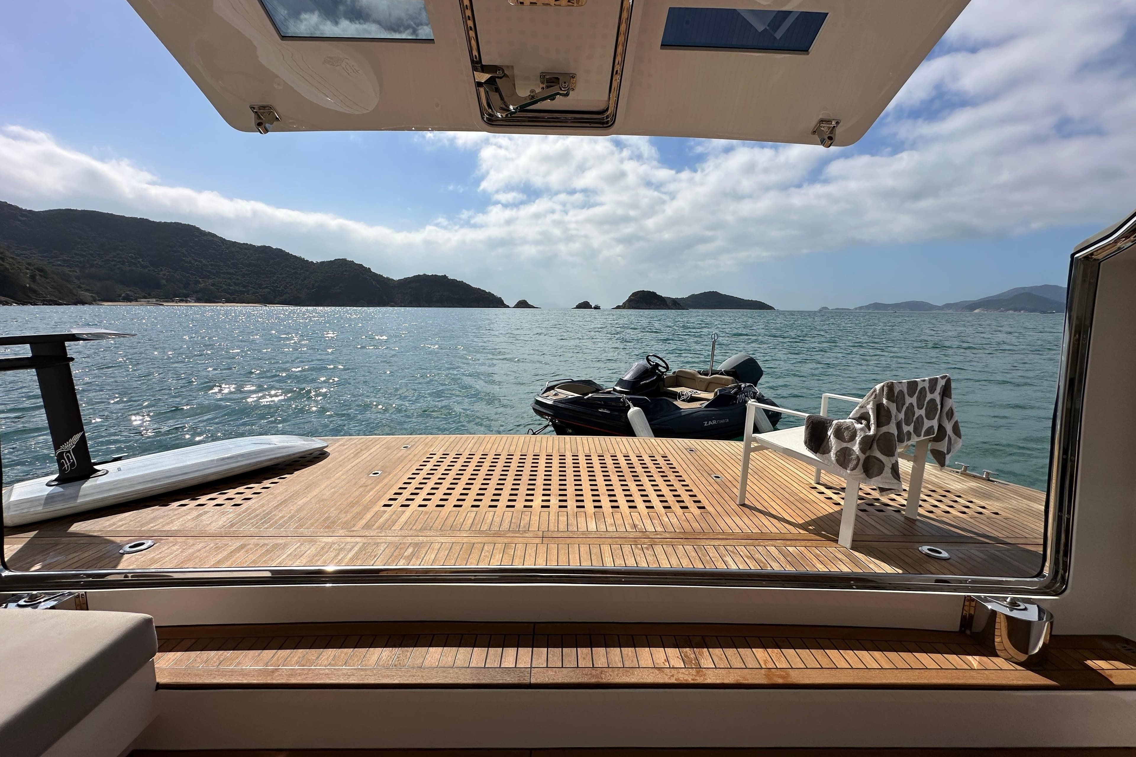 Luxury Horizon FD80 yacht deck with scenic ocean view, 2021 model.