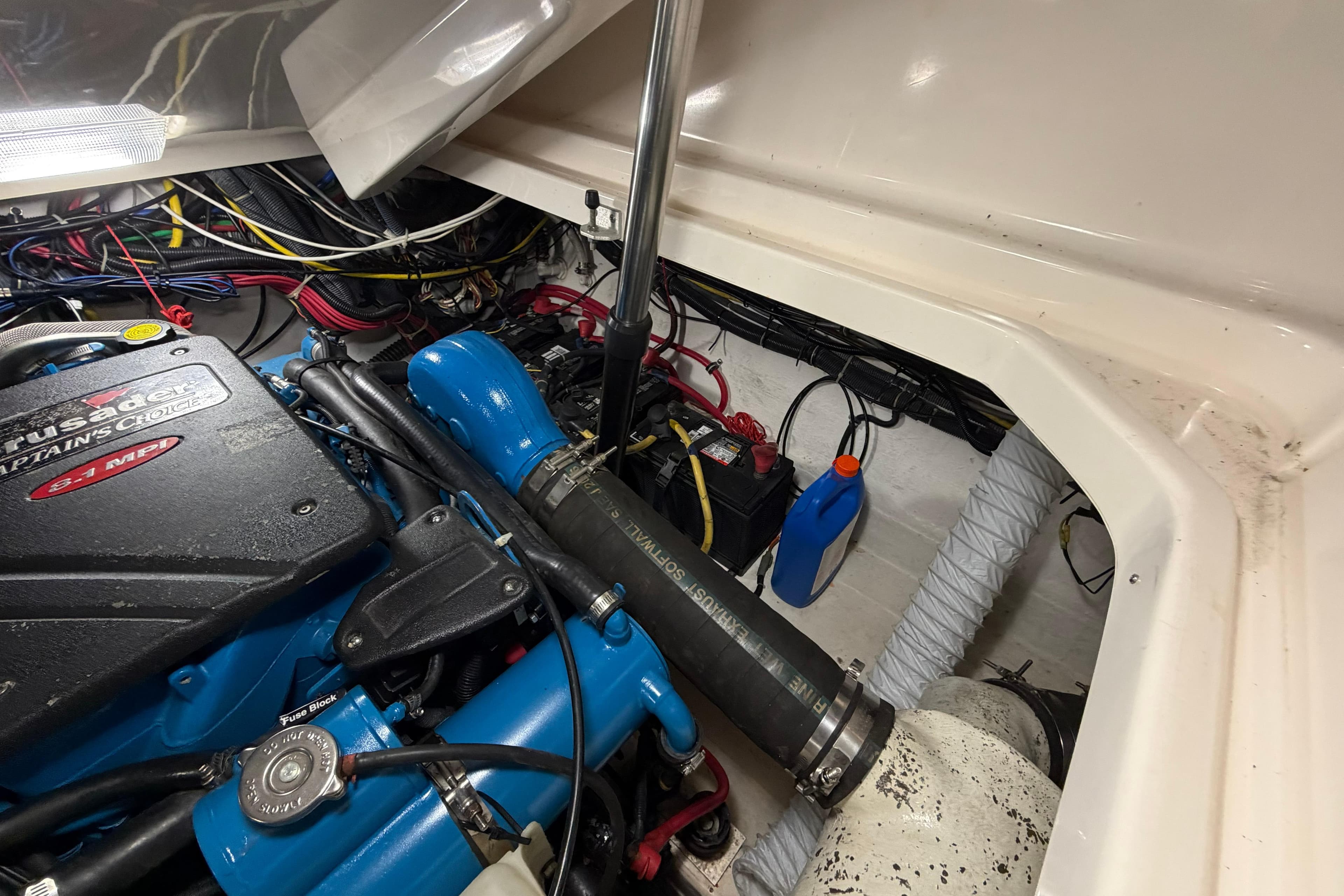 Engine compartment of a 2004 Tiara Yachts 3200 Open, showcasing wiring and components.