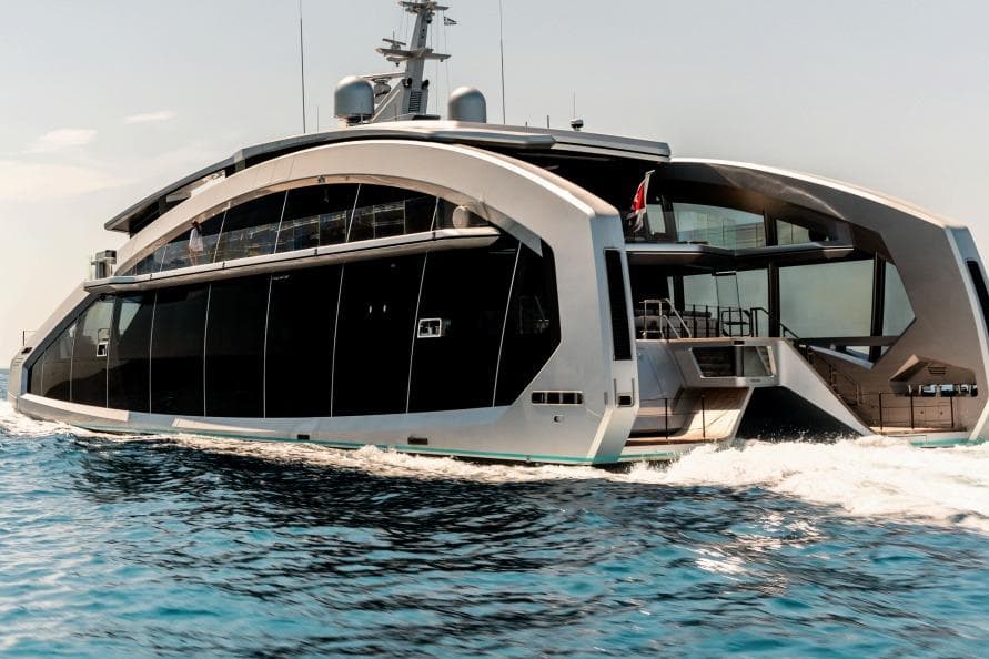 Luxurious 2024 Tecnomar Custom yacht cruising on open water, showcasing sleek modern design.