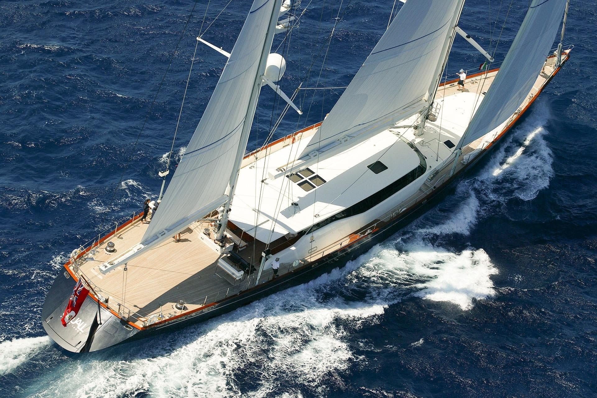 Aerial view of 2002 Perini Navi Cruising Ketch sailing on open ocean.