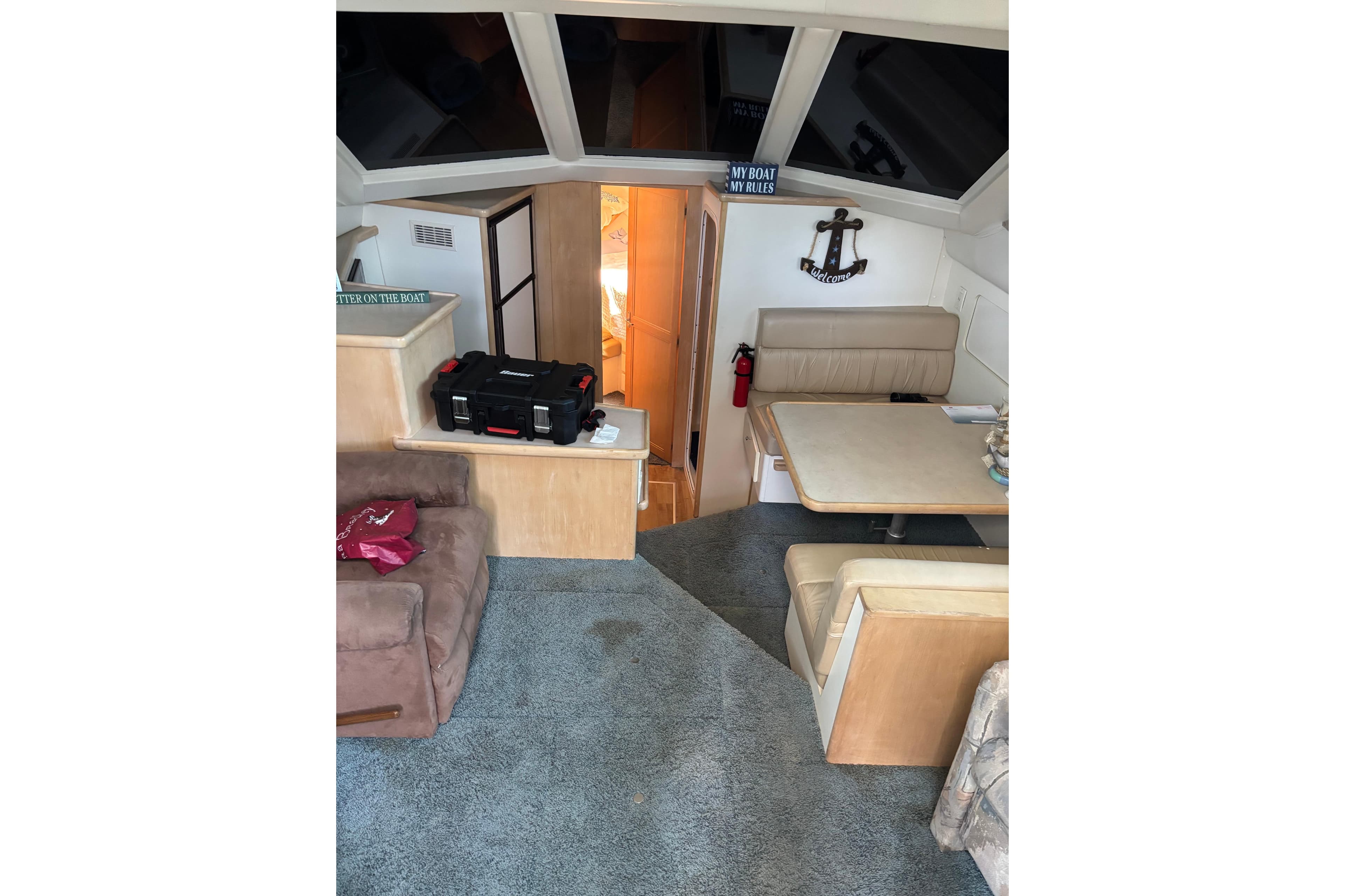 Interior of 1997 Carver 400 Cockpit Motor Yacht with seating and decor.