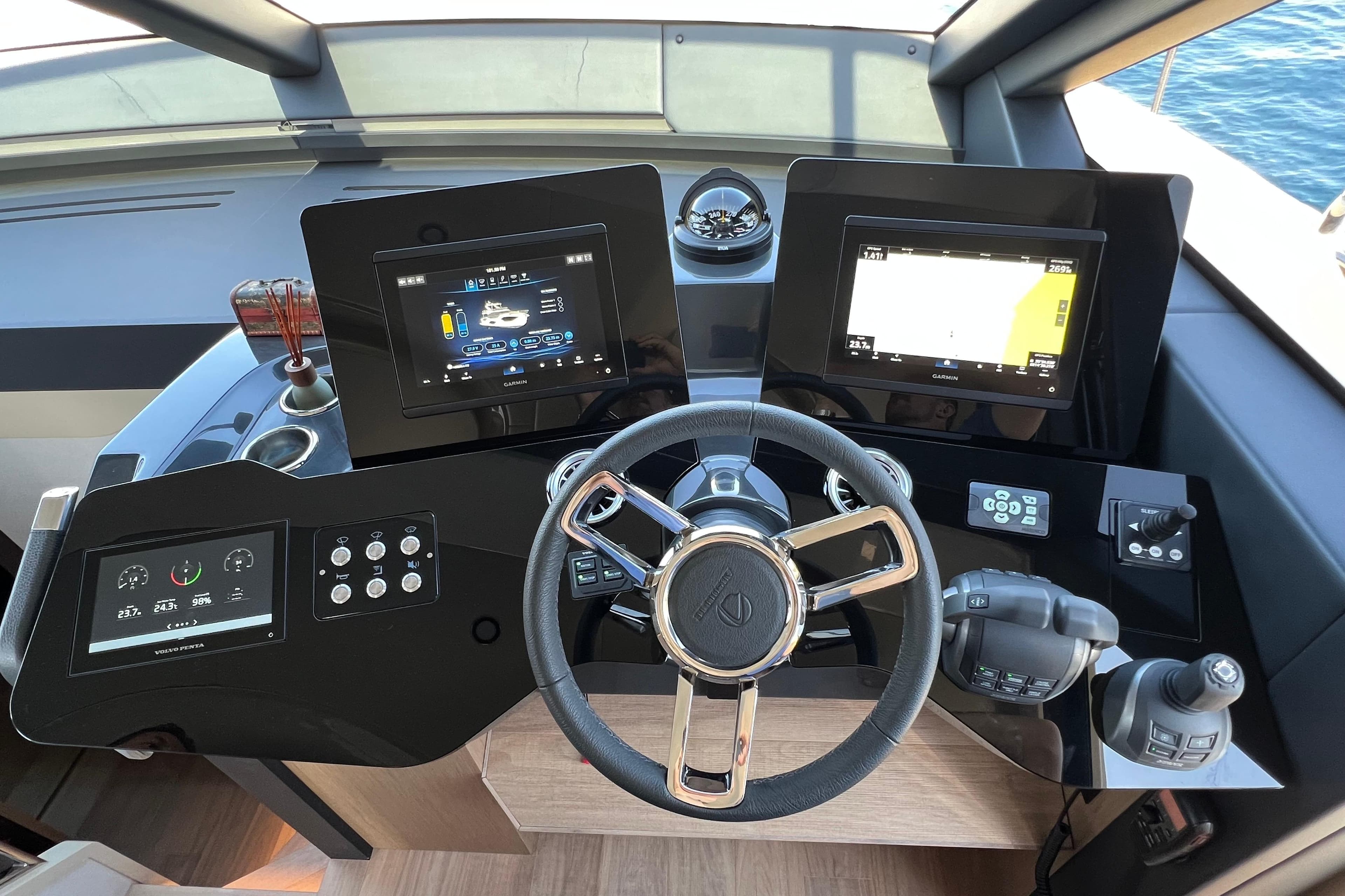 Cockpit of 2023 Absolute 52 Fly yacht with advanced navigation controls and displays.