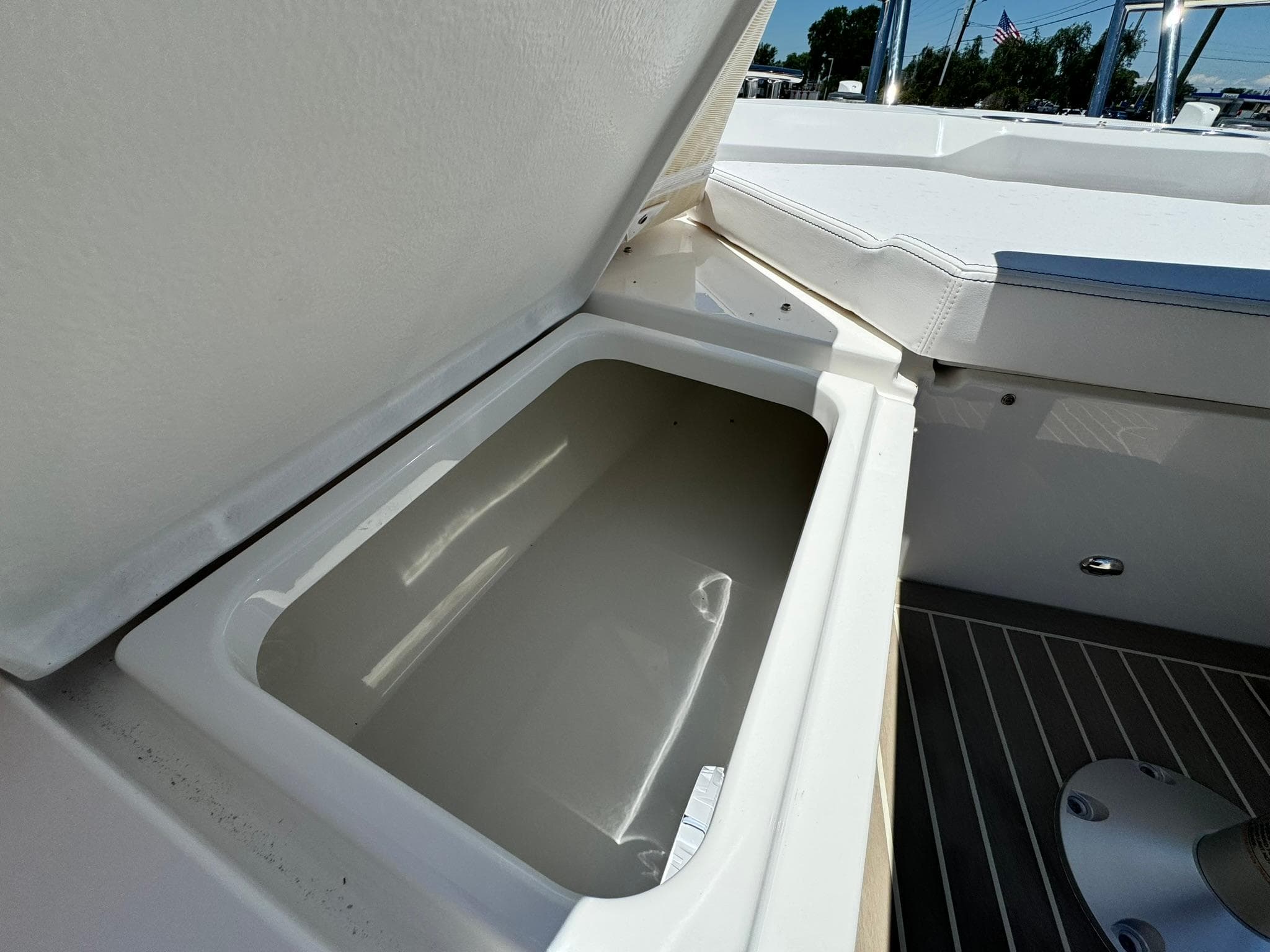 Open storage compartment on 2024 Windy SR28 CC boat.