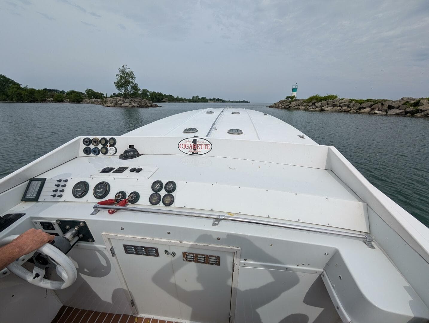 1978 Cigarette 36 boat navigating through calm waters, showcasing dashboard and controls.