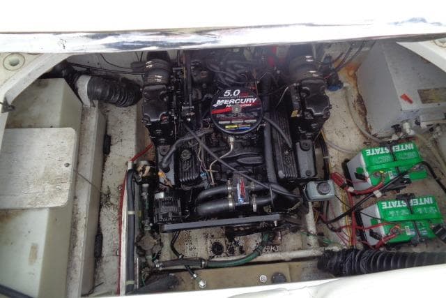 Engine compartment of a 2000 Bayliner 2455 Ciera Sunbridge with a 5.0 Mercury engine.