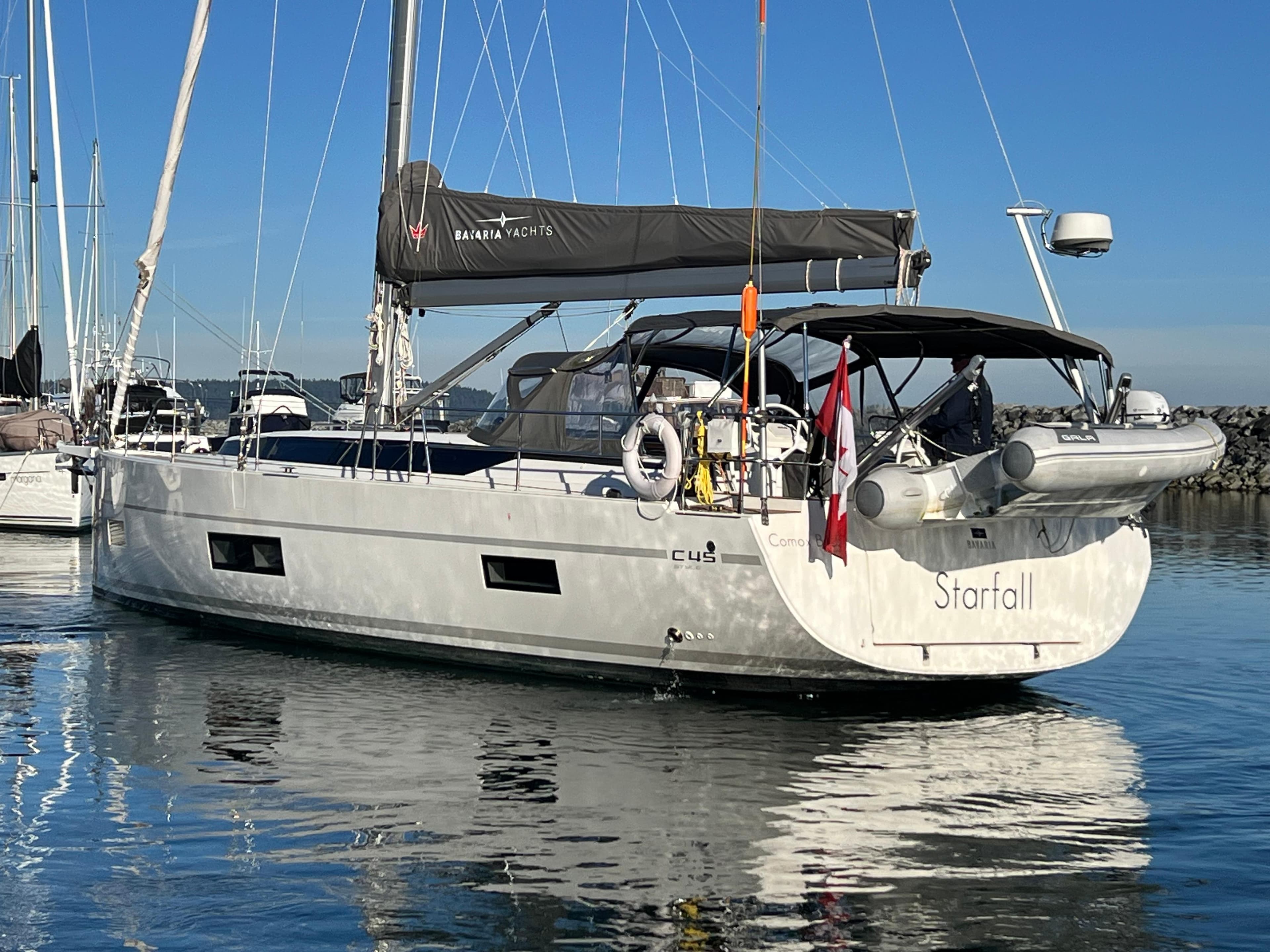 2019 Bavaria C45 Style yacht docked in calm waters, featuring sleek design and modern amenities.