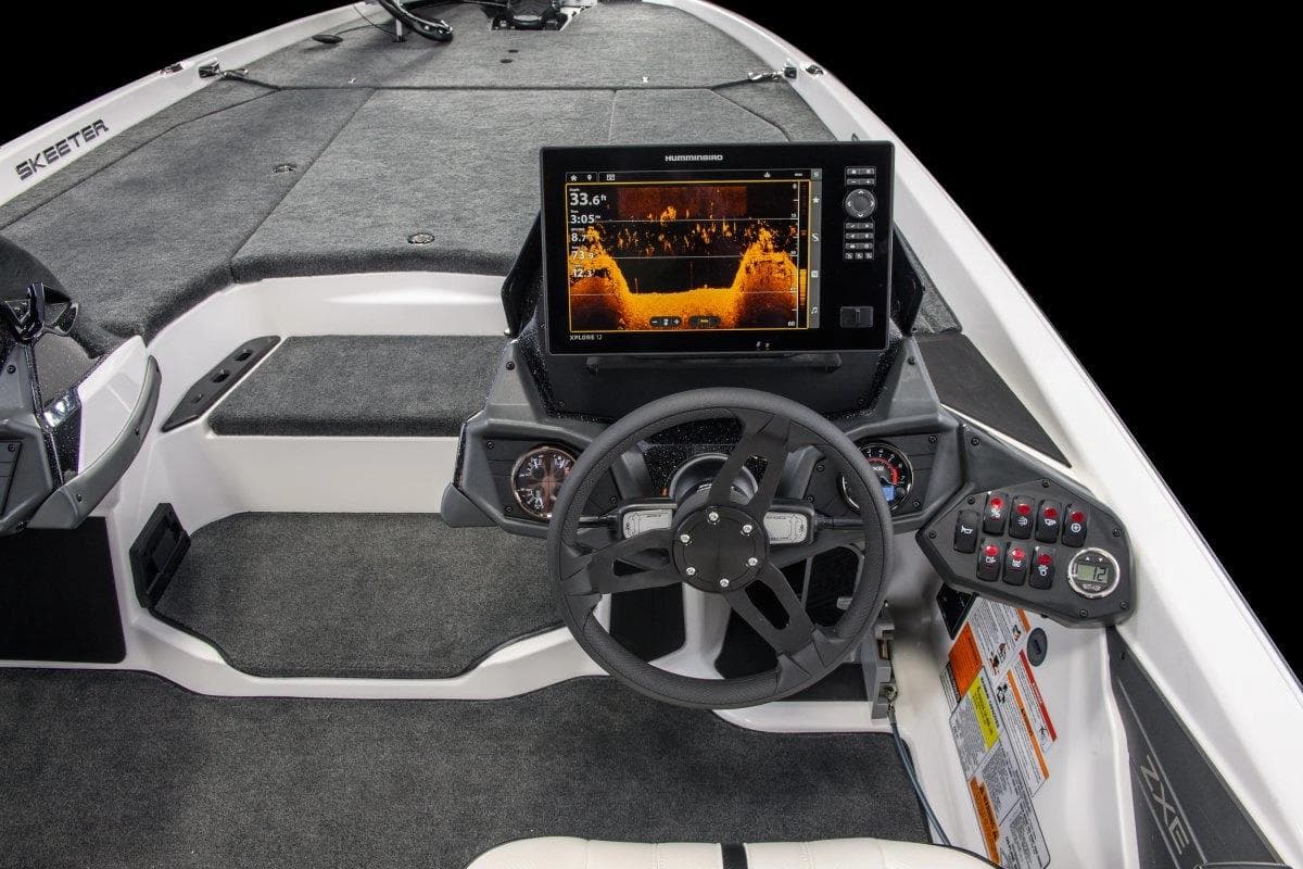 Manufacturer Provided Image: 2026 Skeeter ZXE21 boat dashboard with sonar display and control panel.